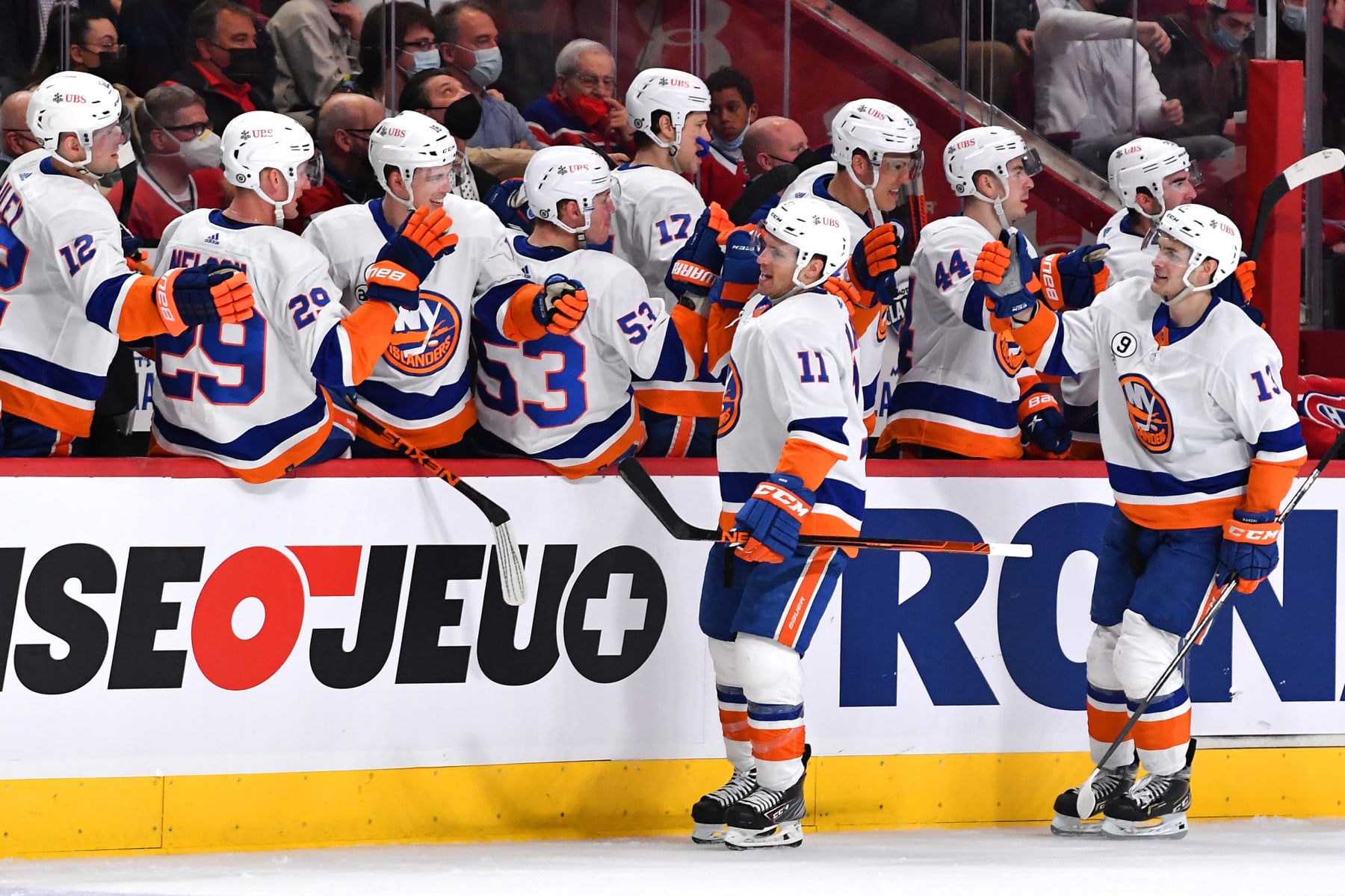 MONTREAL, QC - APRIL 15: Zach Parise #11 of the New York Islanders celebrates with the bench after scoring a goal against the Montreal Canadiens in the NHL game at the Bell Centre on April 15, 2022 in Montreal, Quebec, Canada. (Photo by Francois Lacasse/NHLI via Getty Images)
