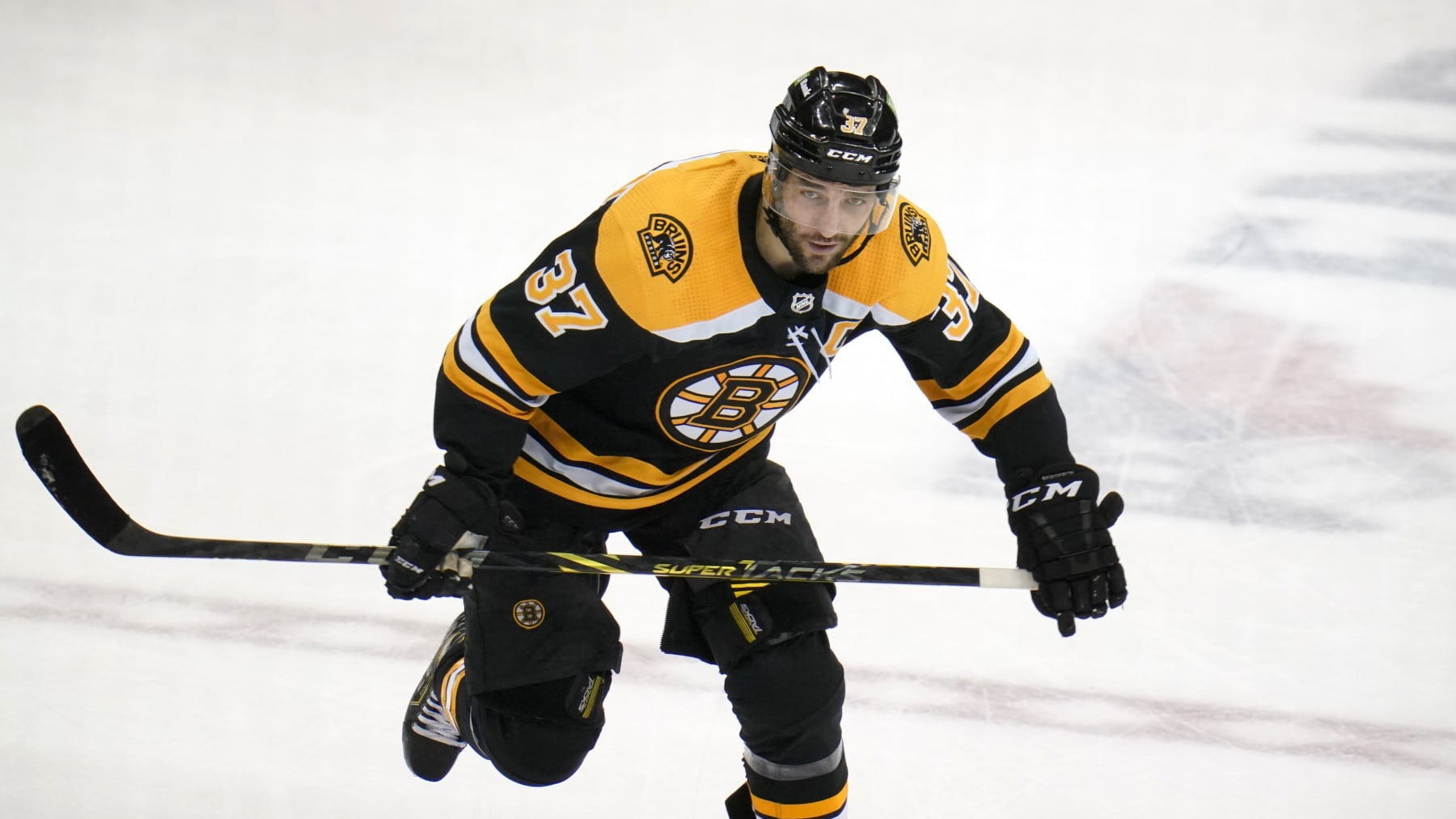 Boston Bruins center Patrice Bergeron plays during the third period of an NHL hockey game against the Pittsburgh Penguins in Pittsburgh, Thursday, April 21, 2022. The Penguins won 4-0.(AP Photo/Gene J. Puskar)