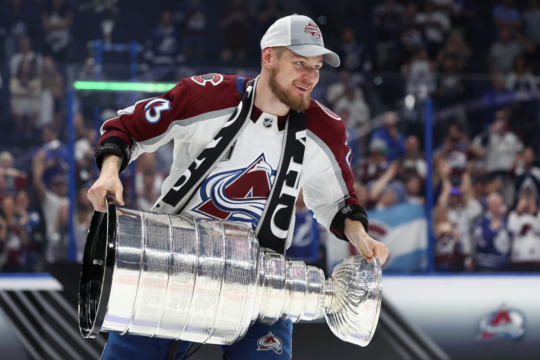 TAMPA, FLORIDA - JUNE 26: Valeri Nichushkin #13 of the Colorado Avalanche lifts the Stanley Cup in celebration after Game Six of the 2022 NHL Stanley Cup Final at Amalie Arena on June 26, 2022 in Tampa, Florida. The Avalanche defeated the Lightning 2-1. (Photo by Christian Petersen/Getty Images)