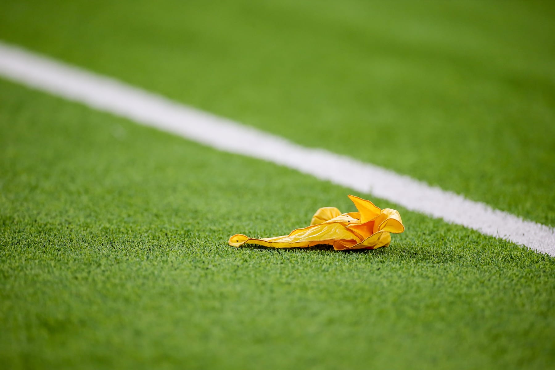 INGLEWOOD, CA - AUGUST 14: NFL yellow flag during the NFL preseason game between the Los Angeles Chargers and the Los Angeles Rams on August 14, 2021, at SoFi Stadium in Inglewood, CA. (Photo by Jevone Moore/Icon Sportswire via Getty Images) INGLEWOOD, CA - AUGUST 14: NFL yellow flag during the NFL preseason game between the Los Angeles Chargers and the Los Angeles Rams on August 14, 2021, at SoFi Stadium in Inglewood, CA. (Photo by Jevone Moore/Icon Sportswire via Getty Images)