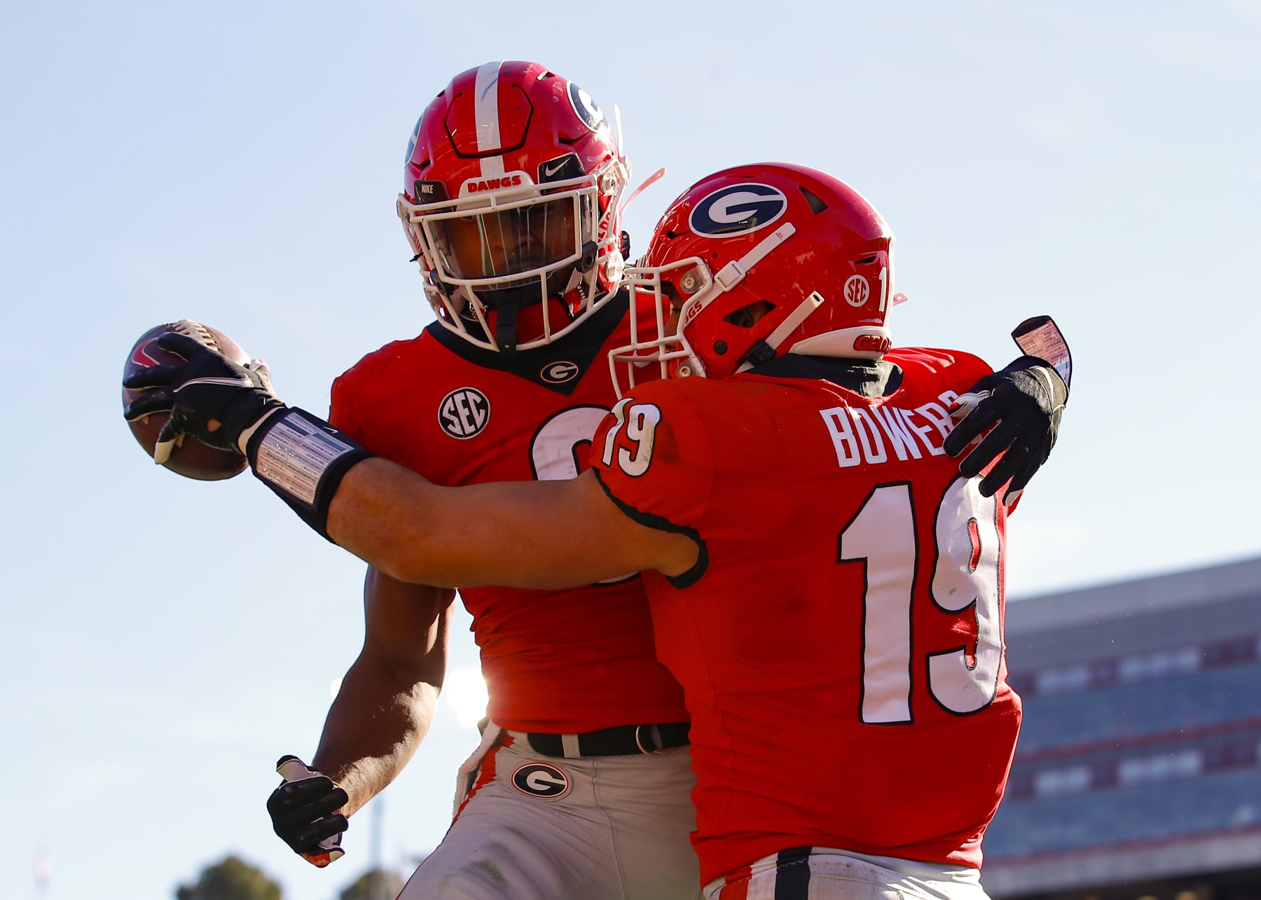 ATHENS, GA - NOVEMBER 20: Brock Bowers #19 celebrates a touchdown with Kenny McIntosh #6 of the Georgia Bulldogs during the first half against the Charleston Southern Buccaneers at Sanford Stadium on November 20, 2021 in Athens, Georgia. (Photo by Todd Kirkland/Getty Images)