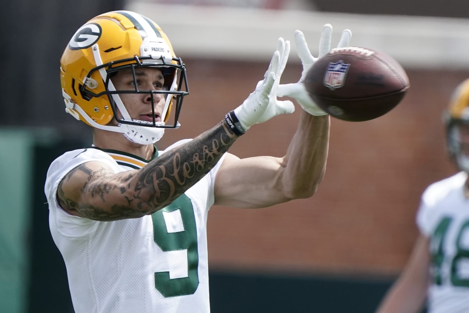 Packers WRs Romeo Doubs, Christian Watson miss practice