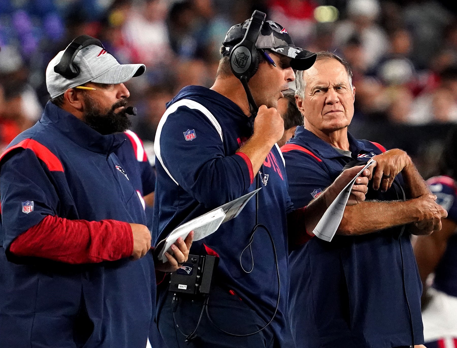 Foxborough, MA - August 11: Matt Patricia, senior football advisor/offensive line coach, Joe Judge, offensive assistant/quarterbacks coach and
Bill Belichick, head coach of the New England Patriots, take in the teams first preseason game against the New York Giants. (Photo by Barry Chin/The Boston Globe via Getty Images)