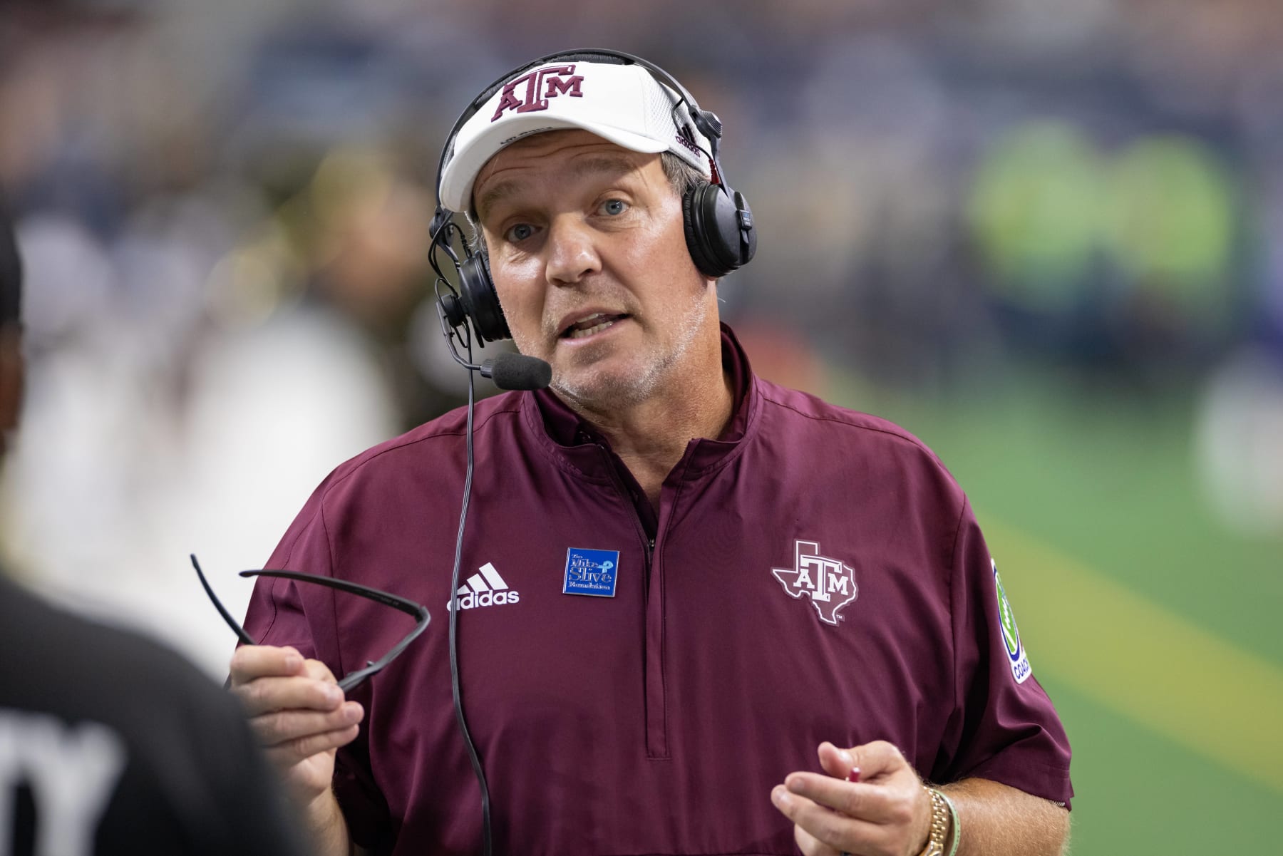 ARLINGTON, TX - SEPTEMBER 25: Texas A&M Aggies head coach Jimbo Fisher is interviewed on the field during the Southwest Classic college football game between the Texas A&M Aggies and Arkansas Razorbacks on September 25, 2021 at AT&T Stadium in Arlington, TX. (Photo by Matthew Visinsky/Icon Sportswire via Getty Images)