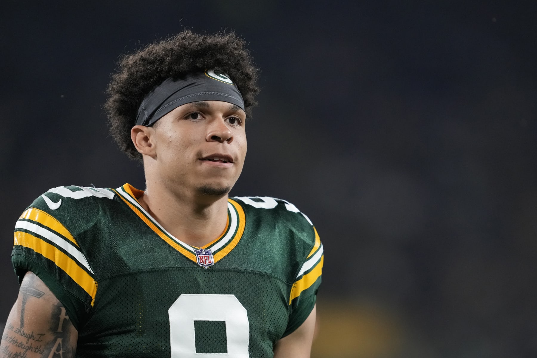GREEN BAY, WISCONSIN - AUGUST 19: Christian Watson #9 of the Green Bay Packers walks off the field after the first half against the New Orleans Saints during a preseason game at Lambeau Field on August 19, 2022 in Green Bay, Wisconsin. (Photo by Patrick McDermott/Getty Images)