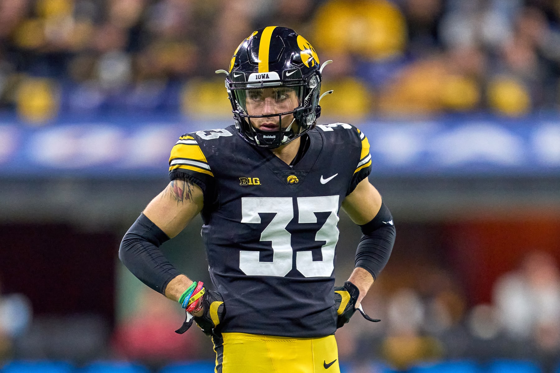 INDIANAPOLIS, IN - DECEMBER 04: Iowa Hawkeyes defensive back Riley Moss (33) looks on during the Big Ten Championship Game between the Iowa Hawkeyes and the Michigan Wolverines on December 04, 2021, at Lucas Oil Stadium, in Indianapolis, IL. (Photo by Robin Alam/Icon Sportswire via Getty Images)