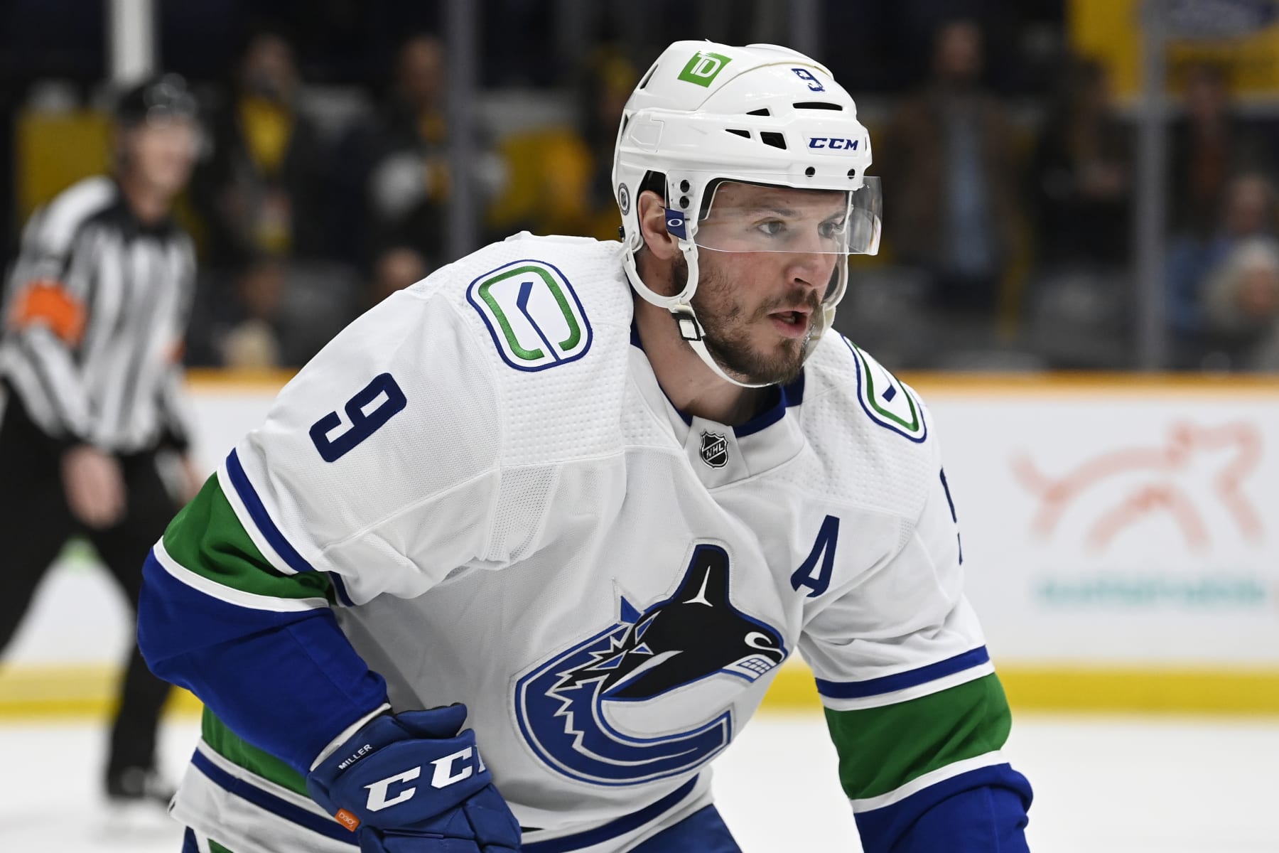 Vancouver Canucks center J.T. Miller (9) plays against the Nashville Predators during the first period of an NHL hockey game Tuesday, Feb. 1, 2022, in Nashville, Tenn. (AP Photo/Mark Zaleski)