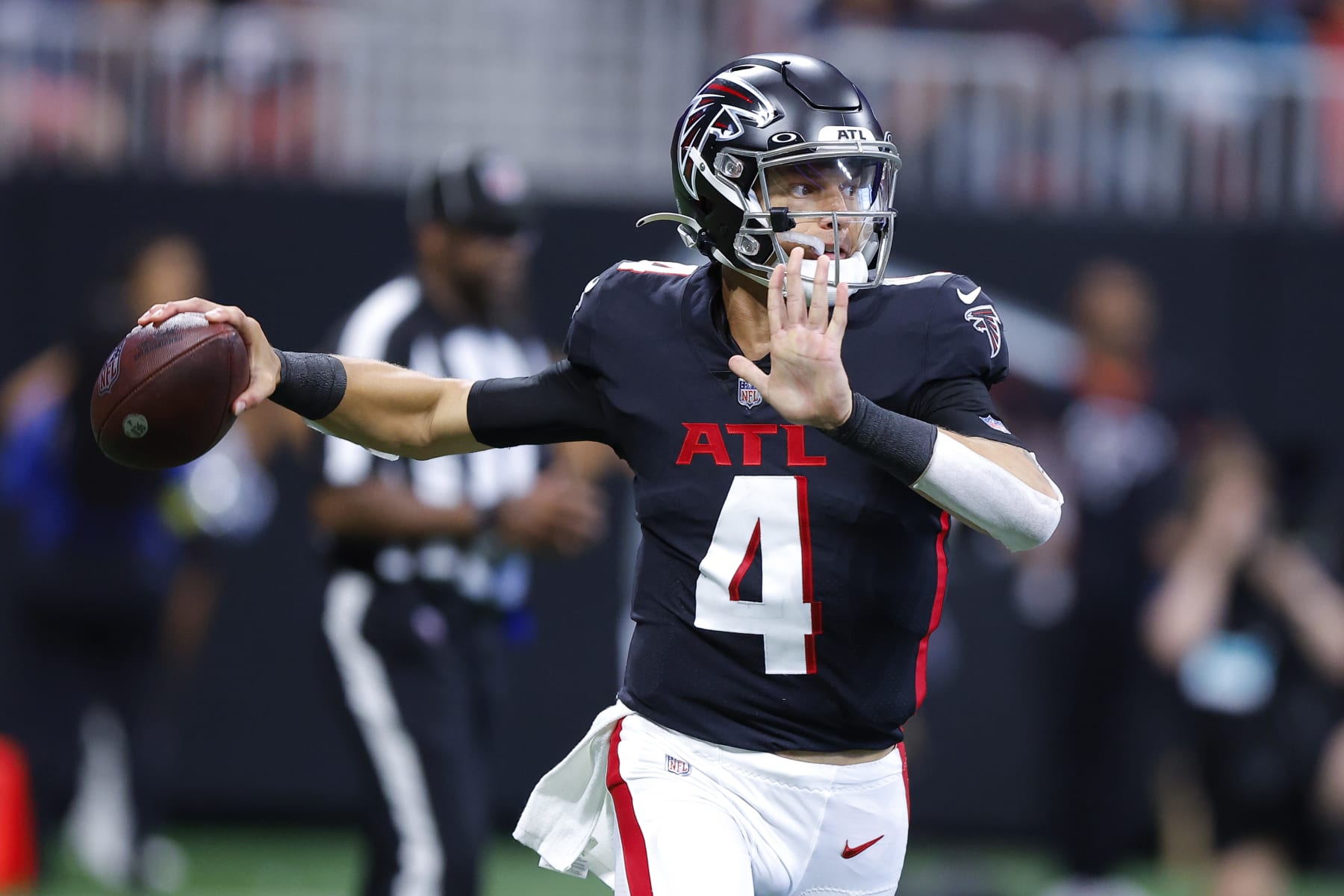 Atlanta Falcons quarterback Desmond Ridder (4) lines up during the second  half of an NFL football game against the Jacksonville Jaguars, Saturday,  Aug. 27, 2022, in Atlanta. The Atlanta Falcons won 28-12. (