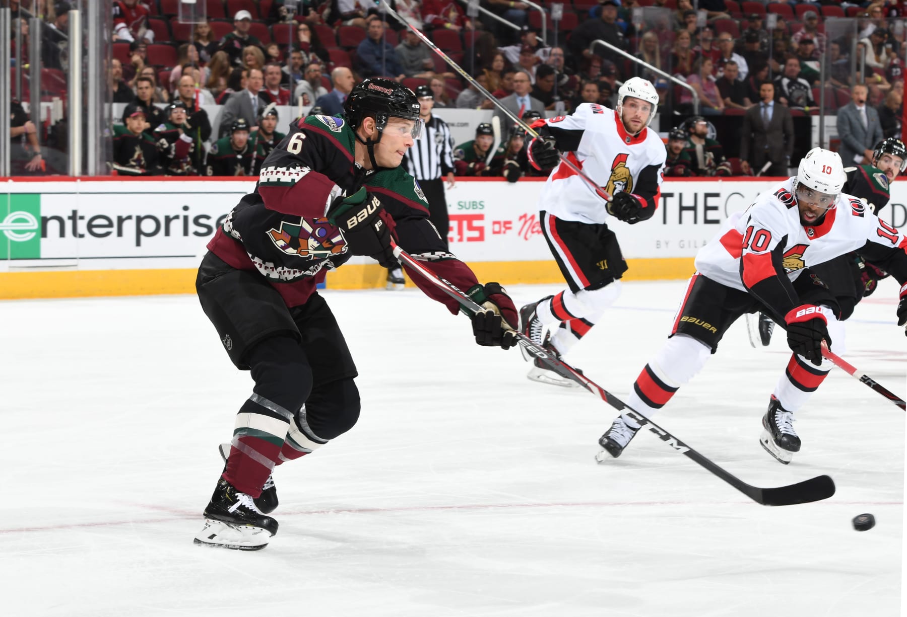 GLENDALE, ARIZONA - OCTOBER 19: Jakob Chychrun #6 of the Arizona Coyotes passes the puck up ice against the Ottawa Senators at Gila River Arena on October 19, 2019 in Glendale, Arizona. (Photo by Norm Hall/NHLI via Getty Images)