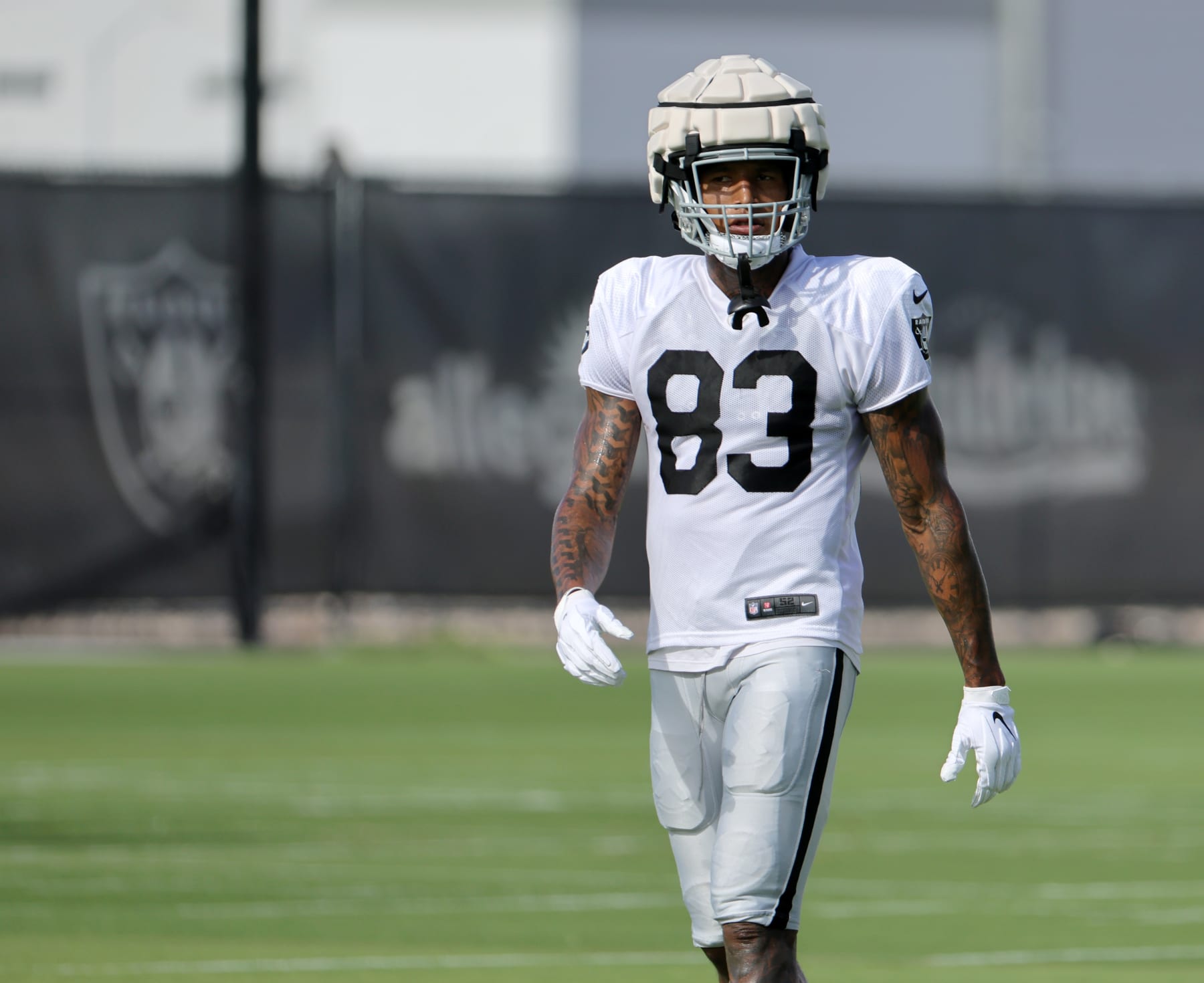 FILE - Las Vegas Raiders tight end Darren Waller looks on before