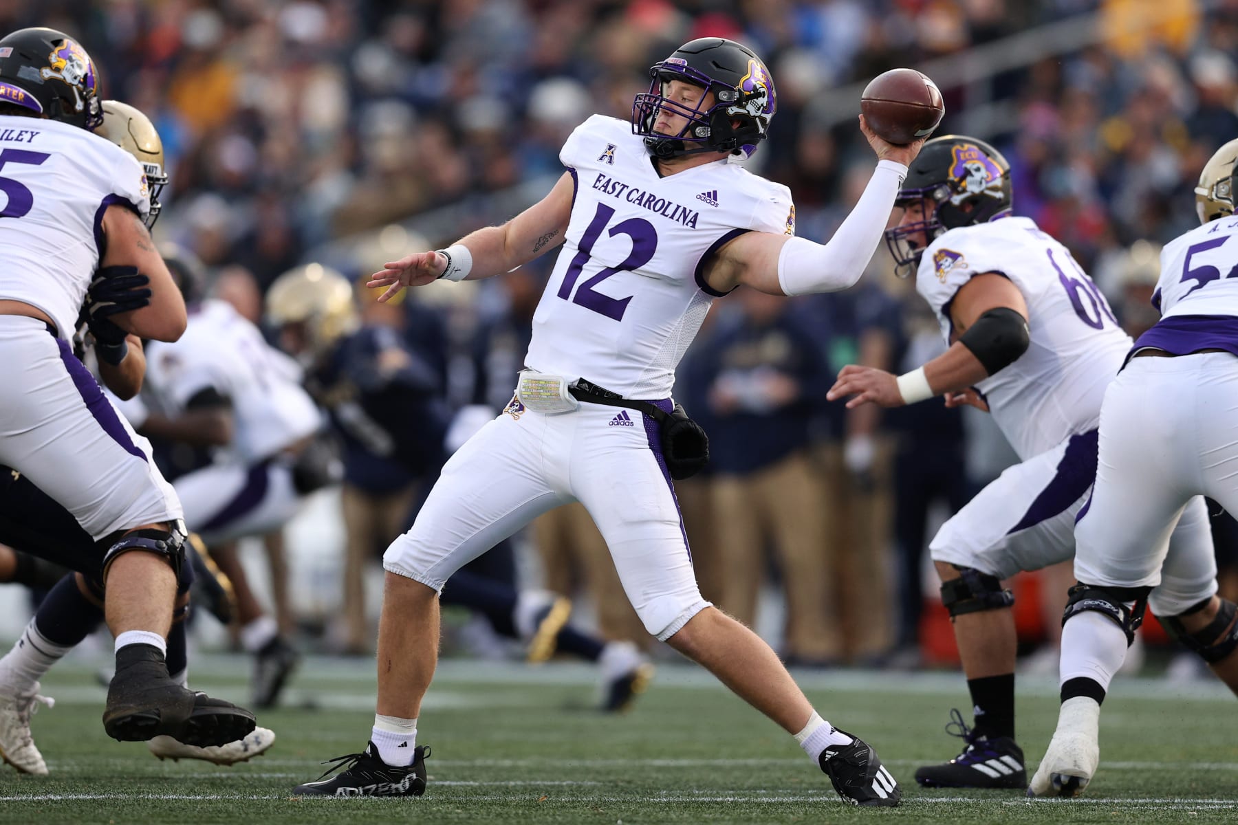 ANNAPOLIS, MARYLAND - NOVEMBER 20: Quarterback Holton Ahlers #12 of the East Carolina Pirates throws a pass against the Navy Midshipmen during the first half at Navy-Marine Corps Memorial Stadium on November 20, 2021 in Annapolis, Maryland. (Photo by Patrick Smith/Getty Images)