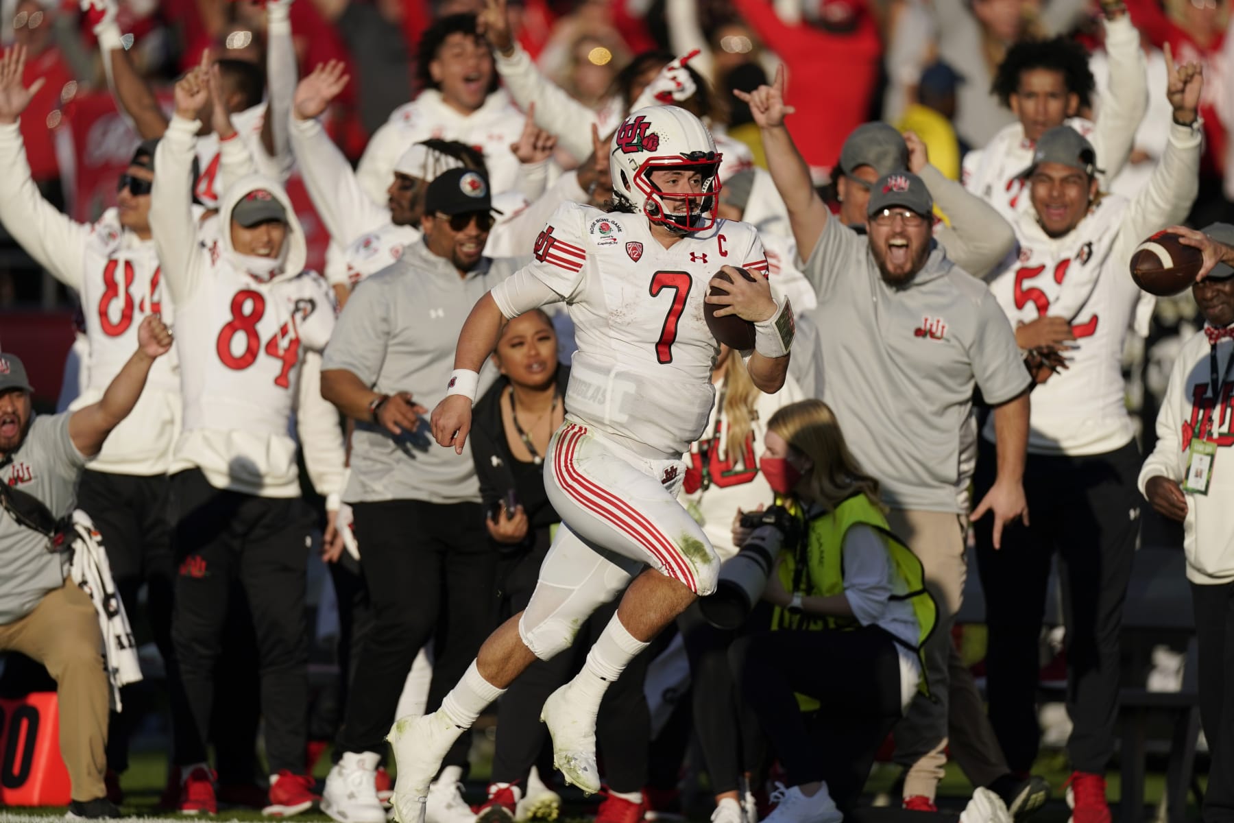 Utah quarterback Cameron Rising (7) runs for a touchdown during the first half in the Rose Bowl NCAA college football game against Ohio State Saturday, Jan. 1, 2022, in Pasadena, Calif. (AP Photo/Mark J. Terrill)
