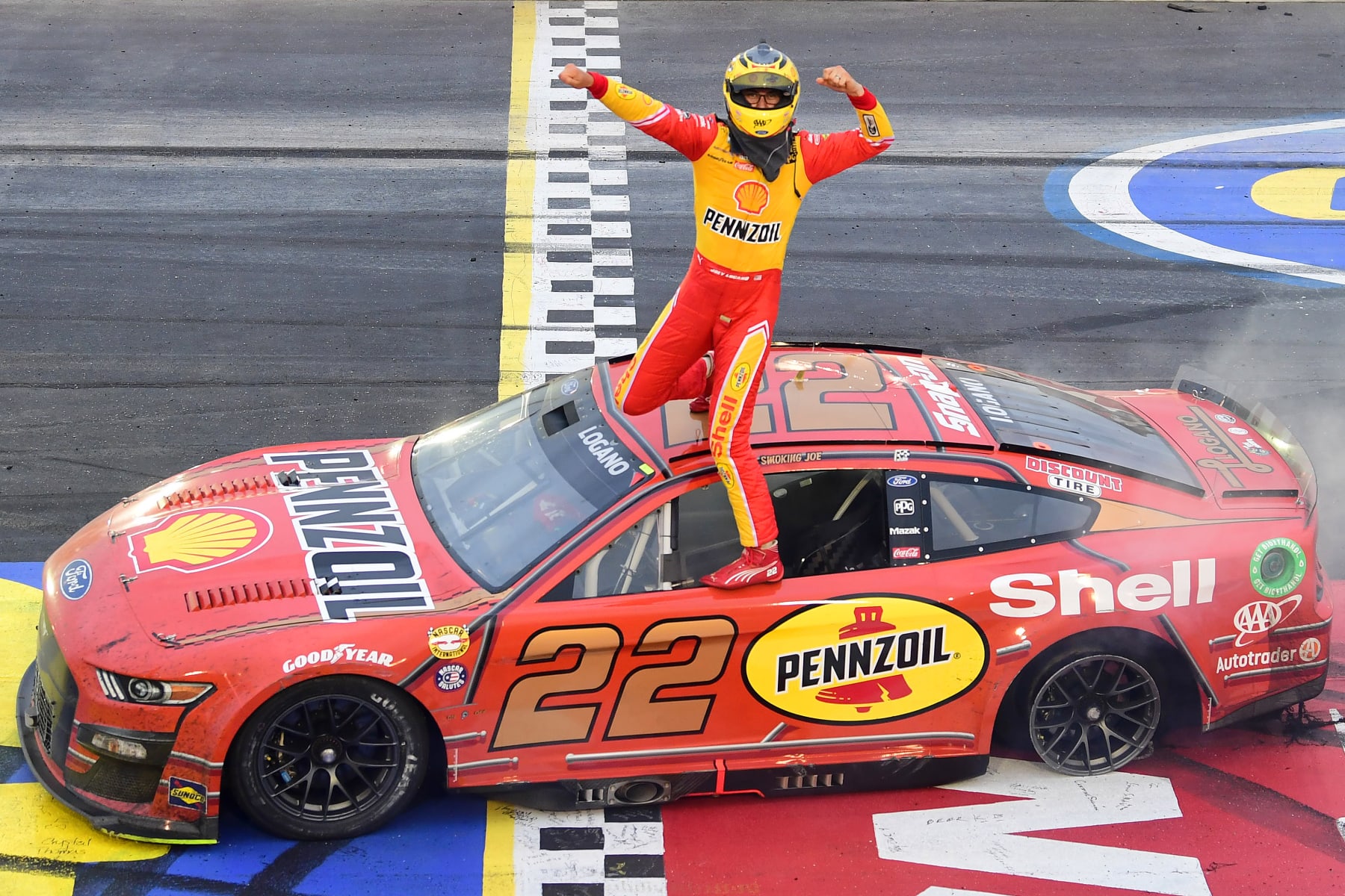 DARLINGTON, SOUTH CAROLINA - MAY 08: Joey Logano, driver of the #22 Shell Pennzoil Ford, celebrates after winning the NASCAR Cup Series Goodyear 400 at Darlington Raceway on May 08, 2022 in Darlington, South Carolina. (Photo by Emilee Chinn/Getty Images)