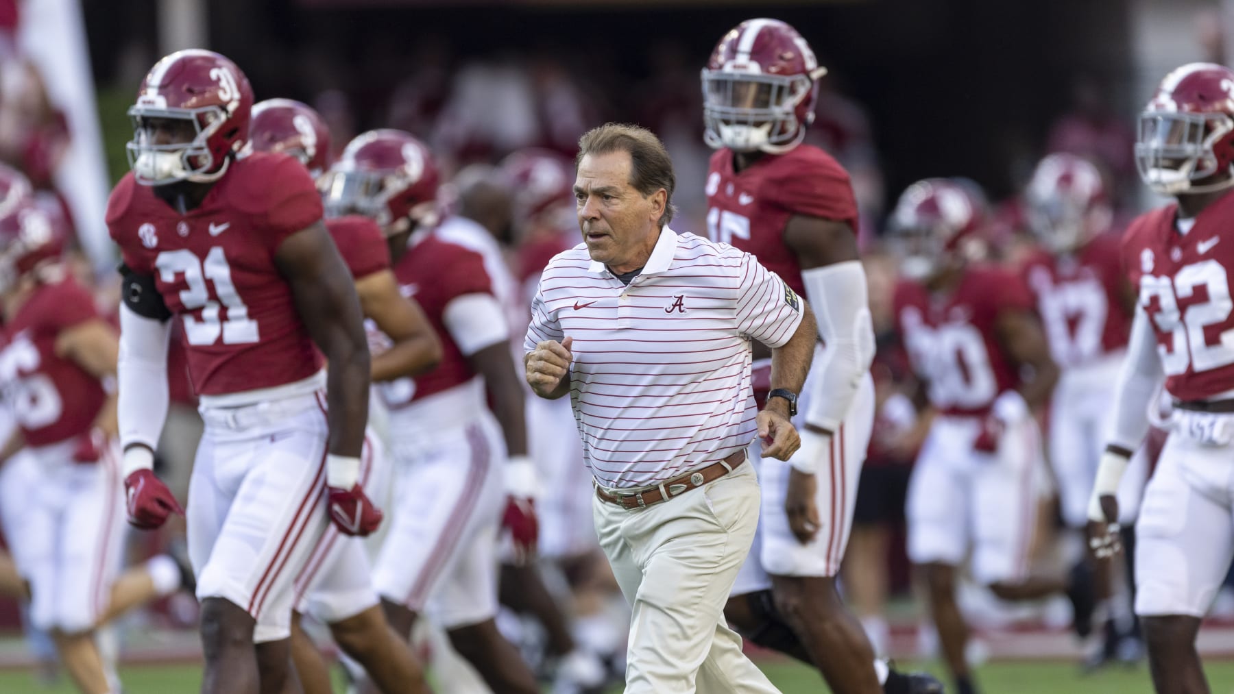 Alabama head coach Nick Saban leads his team onto the field before an NCAA college football game against Utah State, Saturday, Sept. 3, 2022, in Tuscaloosa, Ala. (AP Photo/Vasha Hunt)