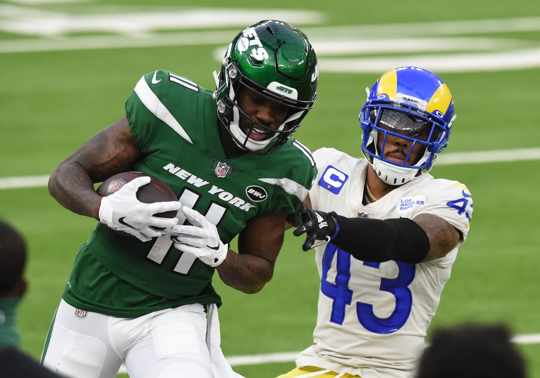 Why a star football player traded NFL career for a tractor - CBS News