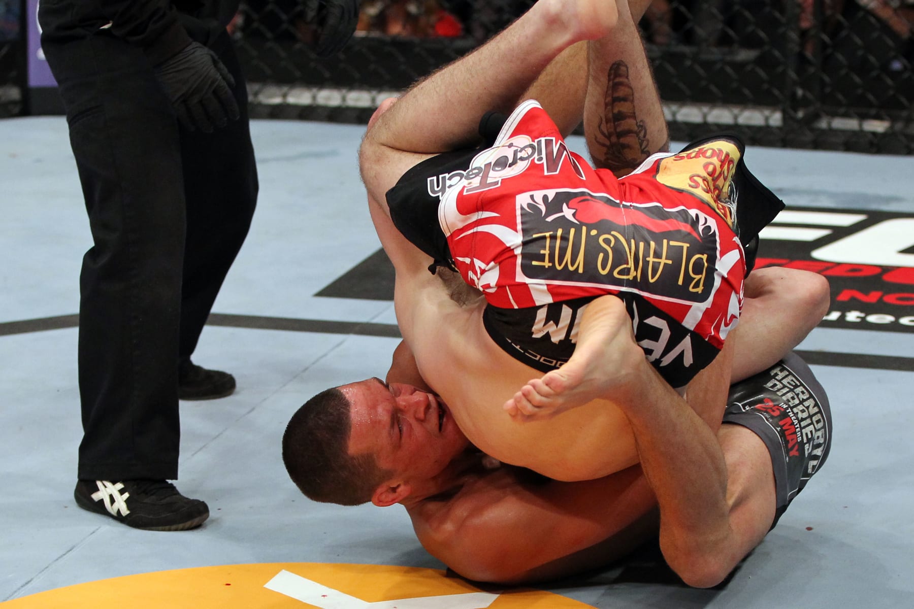 EAST RUTHERFORD, NJ - MAY 05: Nate Diaz Takes down Jim Miller during their Lightweight bout at Izod Center on May 5, 2012 in East Rutherford, New Jersey. (Photo by Josh Hedges/Zuffa LLC/Zuffa LLC via Getty Images)