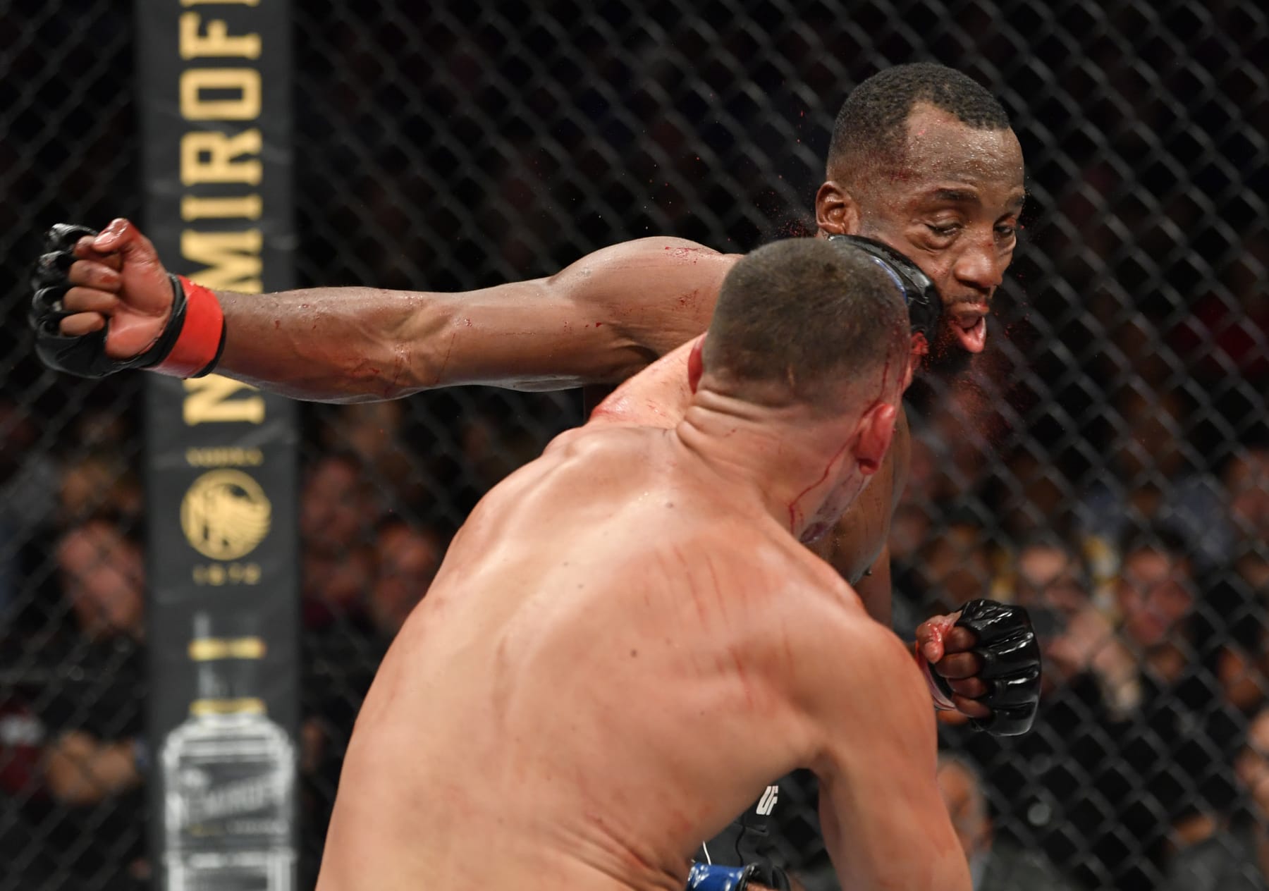 GLENDALE, ARIZONA - JUNE 12: (L-R) Nate Diaz punches Leon Edwards of Jamaica in their welterweight fight during the UFC 263 event at Gila River Arena on June 12, 2021 in Glendale, Arizona. (Photo by Jeff Bottari/Zuffa LLC)