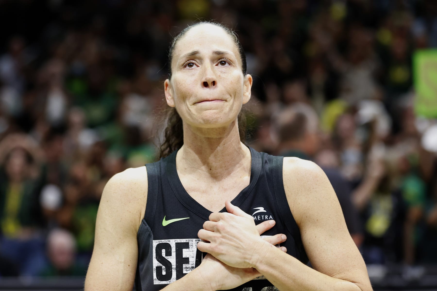 SEATTLE, WASHINGTON - SEPTEMBER 06: Sue Bird #10 of the Seattle Storm reacts after losing to the Las Vegas Aces 97-92 in her final game of her career during Game Four of the 2022 WNBA Playoffs semifinals at Climate Pledge Arena on September 06, 2022 in Seattle, Washington. (Photo by Steph Chambers/Getty Images)