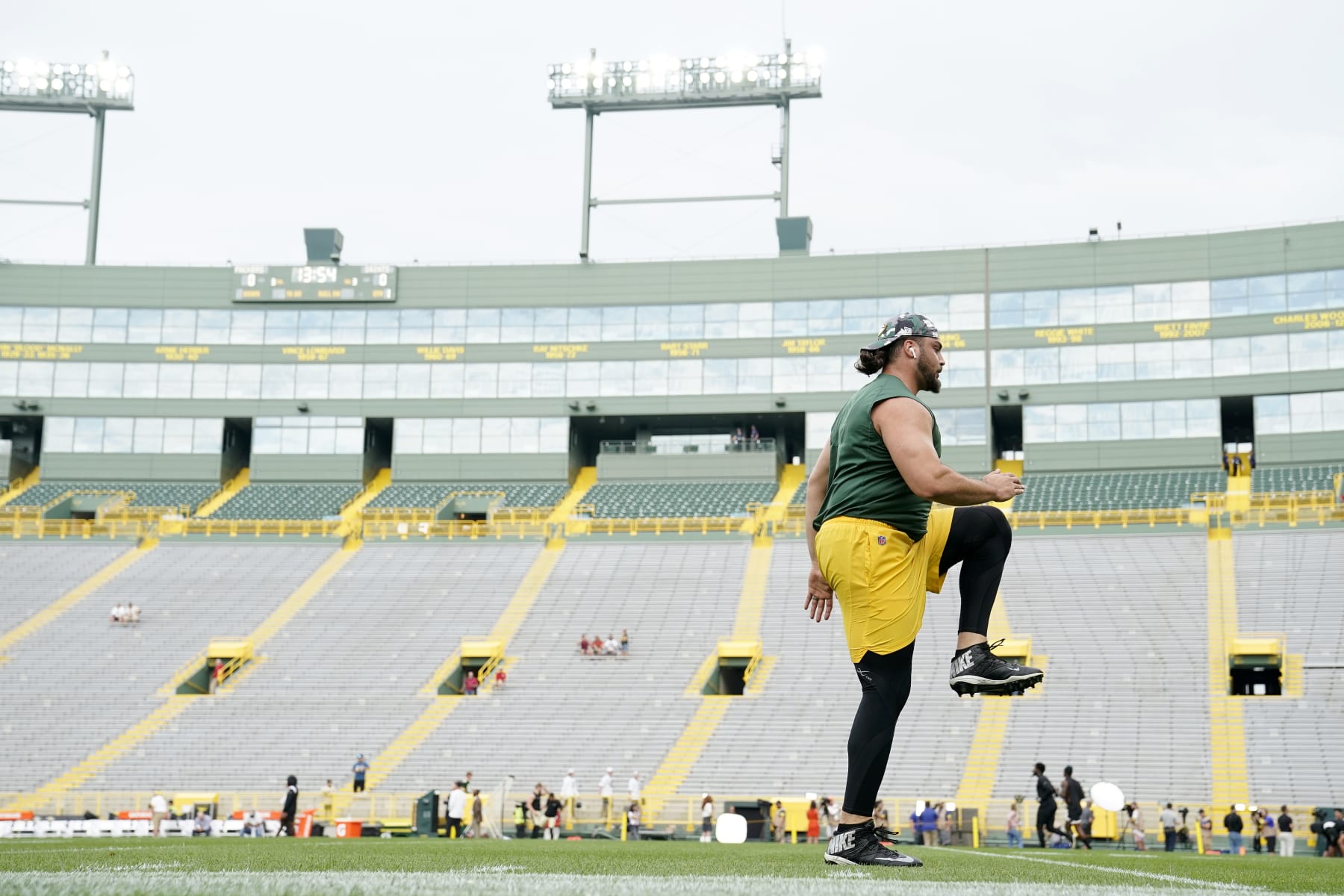 GREEN BAY, WISCONSIN - AUGUST 19: David Bakhtiari #69 of the Green Bay Packers warms up before a preseason game against the New Orleans Saints at Lambeau Field on August 19, 2022 in Green Bay, Wisconsin. (Photo by Patrick McDermott/Getty Images)