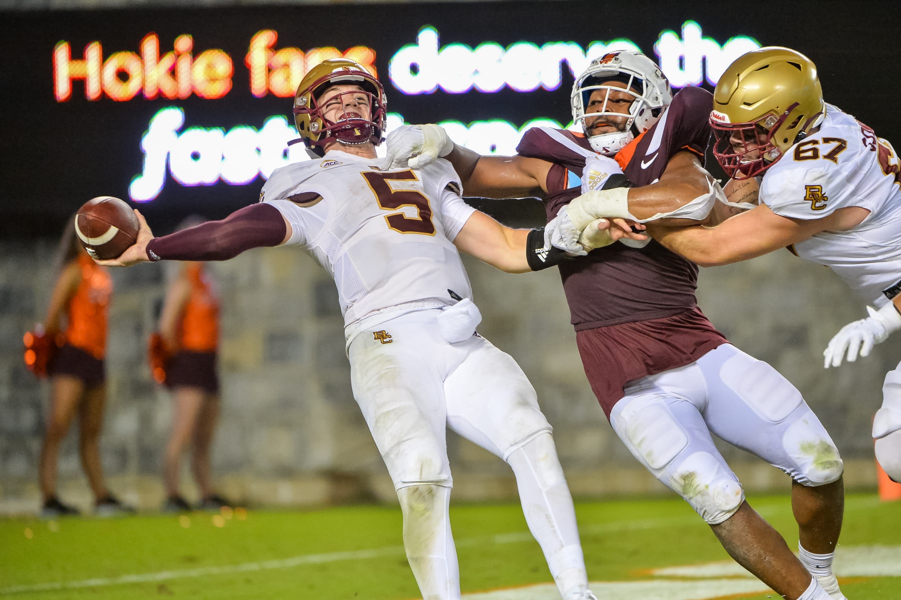 BLACKSBURG, VA - SEPTEMBER 10: Virginia Tech Hokies defensive lineman TyJuan Garbutt (45) hurries the Boston College Eagles quarterback Phil Jurkovec (5) during the Virginia Tech Hokies game versus the Boston College Eagles on September 10, 2022, at Lane Stadium in Blacksburg, VA. (Photo by Brian Bishop/Icon Sportswire via Getty Images)