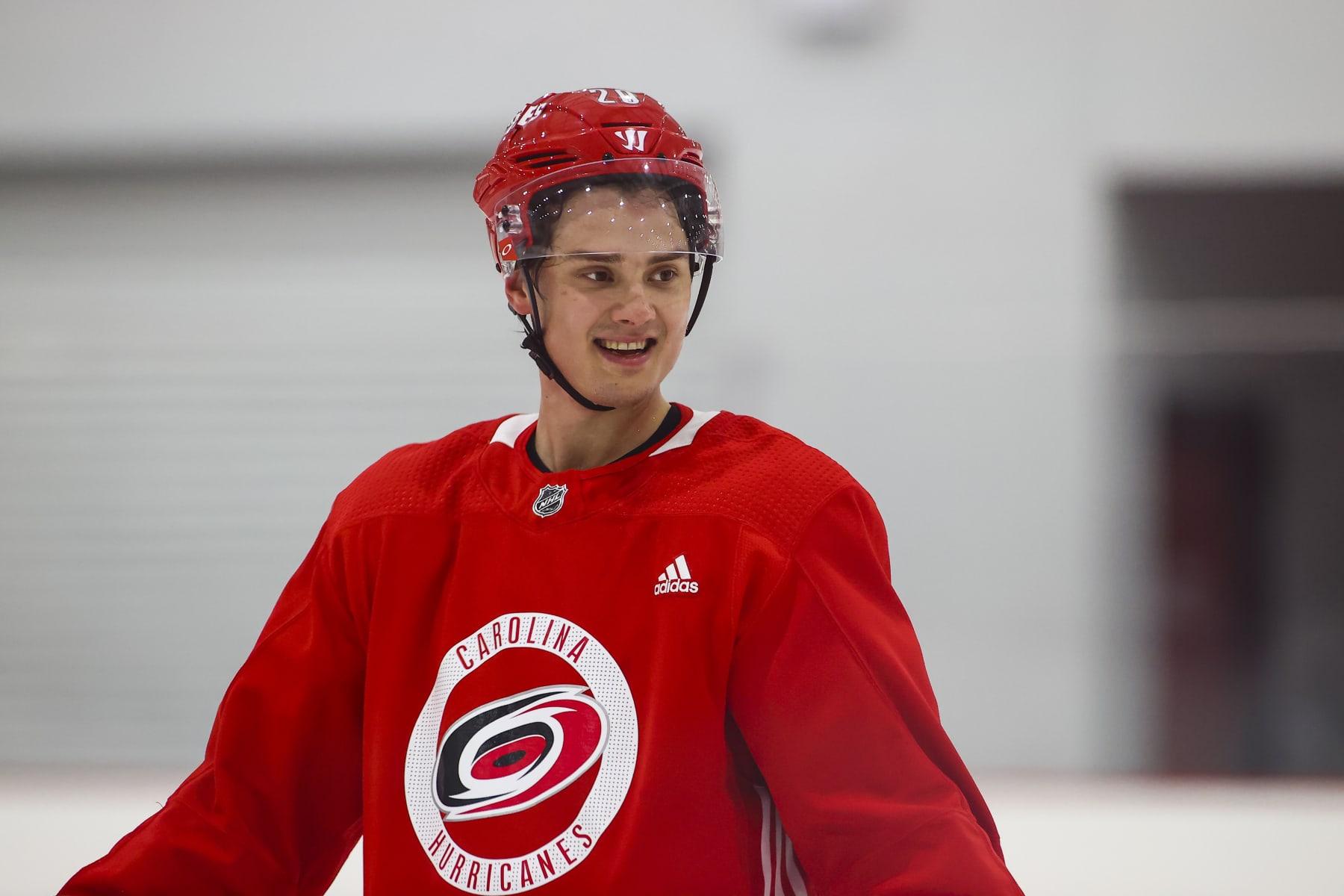 MORRISVILLE, NC - JANUARY 05: Carolina Hurricanes left wing Sebastian Aho (20) smiles during the Carolina Hurricanes Training Camp on January 5th, 2021 at Wake Competition Center in Morrisville, NC. (Photo by Jaylynn Nash/Icon Sportswire via Getty Images)