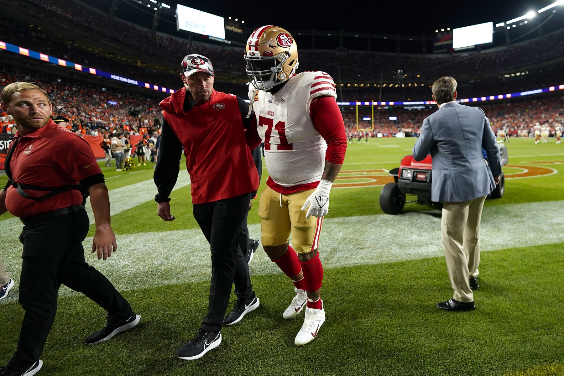 San Francisco 49ers offensive tackle Trent Williams (71) walks off the field during the second half of an NFL football game against the Denver Broncos in Denver, Sunday, Sept. 25, 2022. (AP Photo/Jack Dempsey) San Francisco 49ers offensive tackle Trent Williams (71) walks off the field during the second half of an NFL football game against the Denver Broncos in Denver, Sunday, Sept. 25, 2022. (AP Photo/Jack Dempsey)