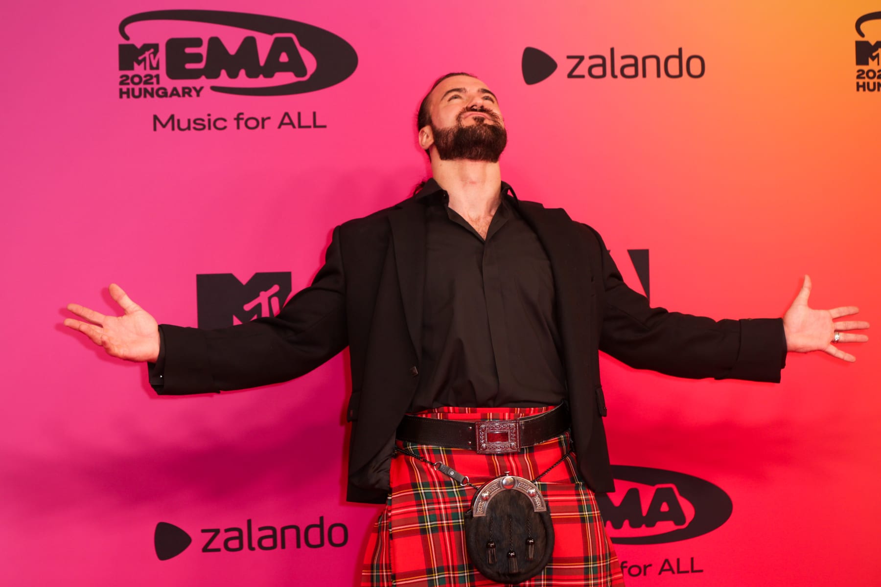 BUDAPEST, HUNGARY - NOVEMBER 14 : Drew McIntyre poses during the 2021 MTV Europe Music Awards - Red Carpet Arrivals at the Papp Laszlo Budapest Sports Arena, on November 14, 2021 in Budapest, Hungary. (Photo by Sven Hoogerhuis/BSR Agency/Getty Images)