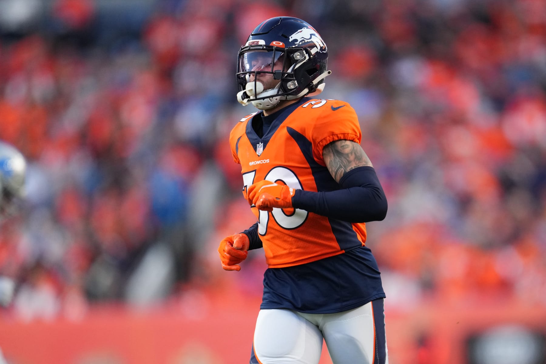 Broncos grab bruising back, O-lineman nicknamed 'The Gut'