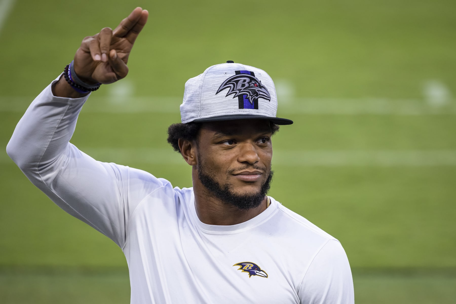 BALTIMORE, MD - JULY 31: Jimmy Smith #22 of the Baltimore Ravens salutes fans during training camp at M&T Bank Stadium on July 31, 2021 in Baltimore, Maryland. (Photo by Scott Taetsch/Getty Images)