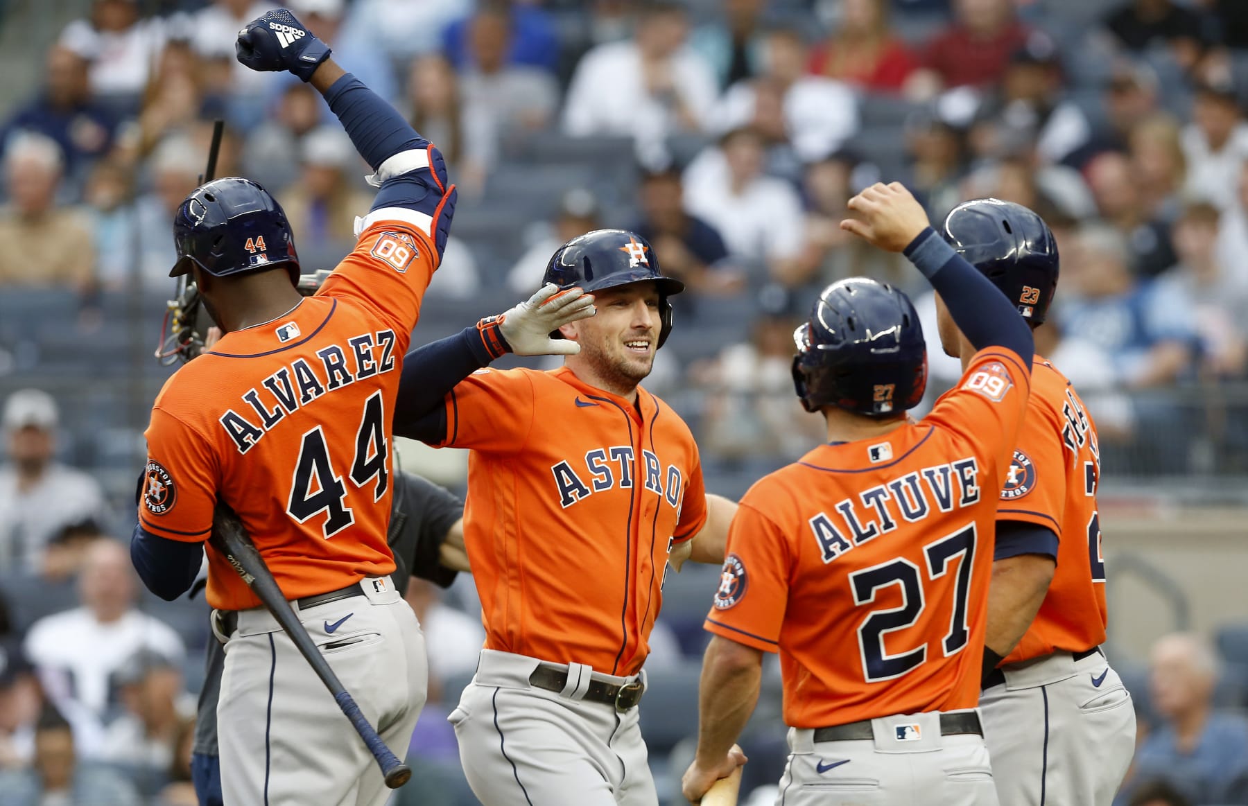 Houston Astros' Jose Altuve scores in front of Tampa Bay Rays catcher  Francisco Mejia on an RBI double by Kyle Tucker during the first inning of  a baseball game Tuesday, Sept. 20