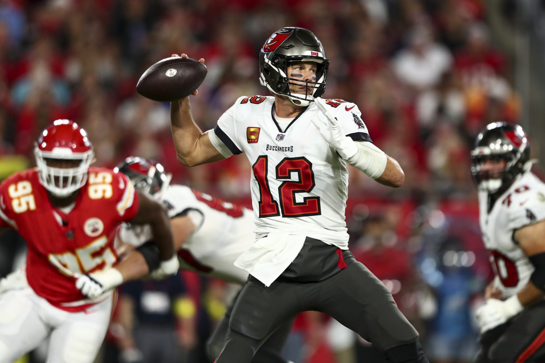 Tampa Bay Buccaneers guard Luke Goedeke (67) pretects the pocket