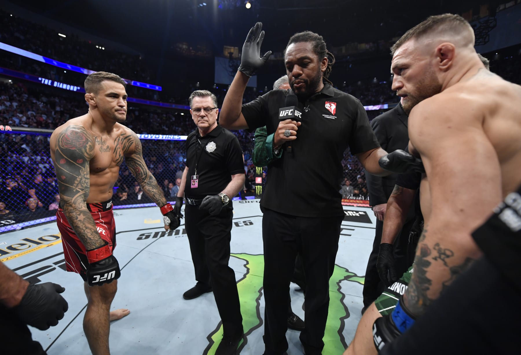 LAS VEGAS, NEVADA - JULY 10: (L-R) Opponents Dustin Poirier and Conor McGregor of Ireland face off prior to their welterweight fight during the UFC 264 event at T-Mobile Arena on July 10, 2021 in Las Vegas, Nevada. (Photo by Jeff Bottari/Zuffa LLC)