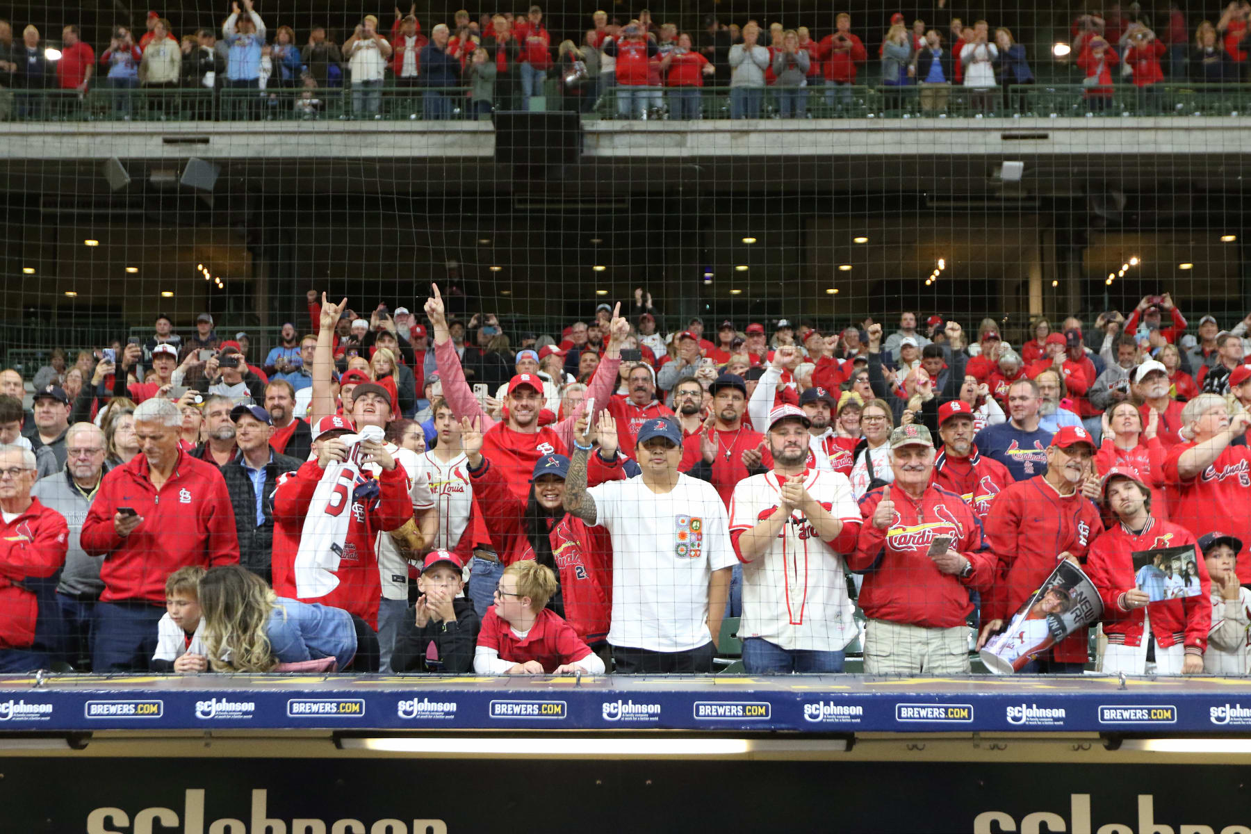MILWAUKEE, WI - SEPTEMBER 27: St. Louis Cardinals fans celebrate with the team after they win the 2022 National League Central Division following a game between the Milwaukee Brewers and the St. Louis Cardinals on September 27, 2022 at American Family Field, in Milwaukee, WI. (Photo by Larry Radloff/Icon Sportswire via Getty Images)