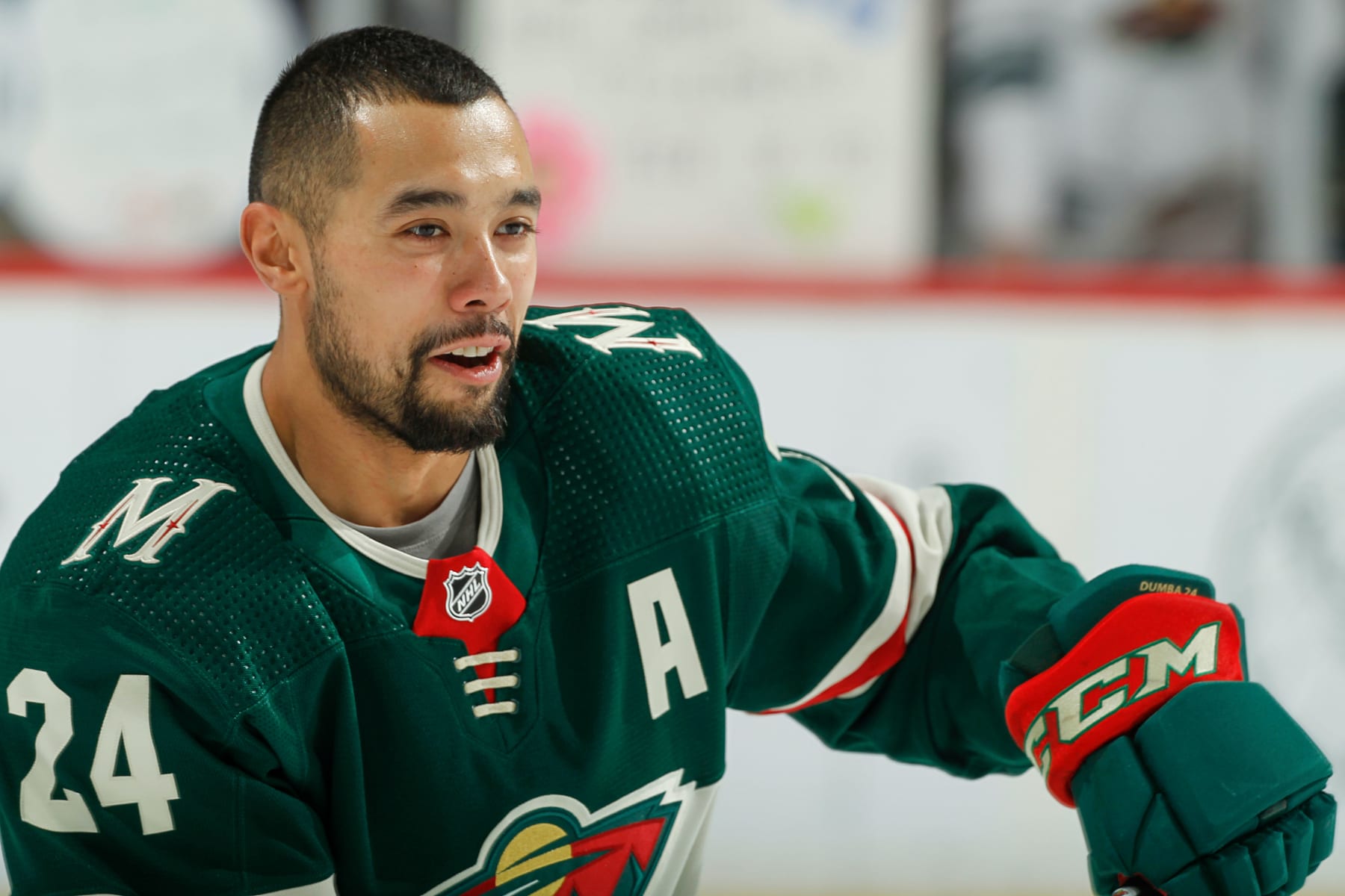 Matt Dumba of the Minnesota Wild warms up wearing a Pride Night