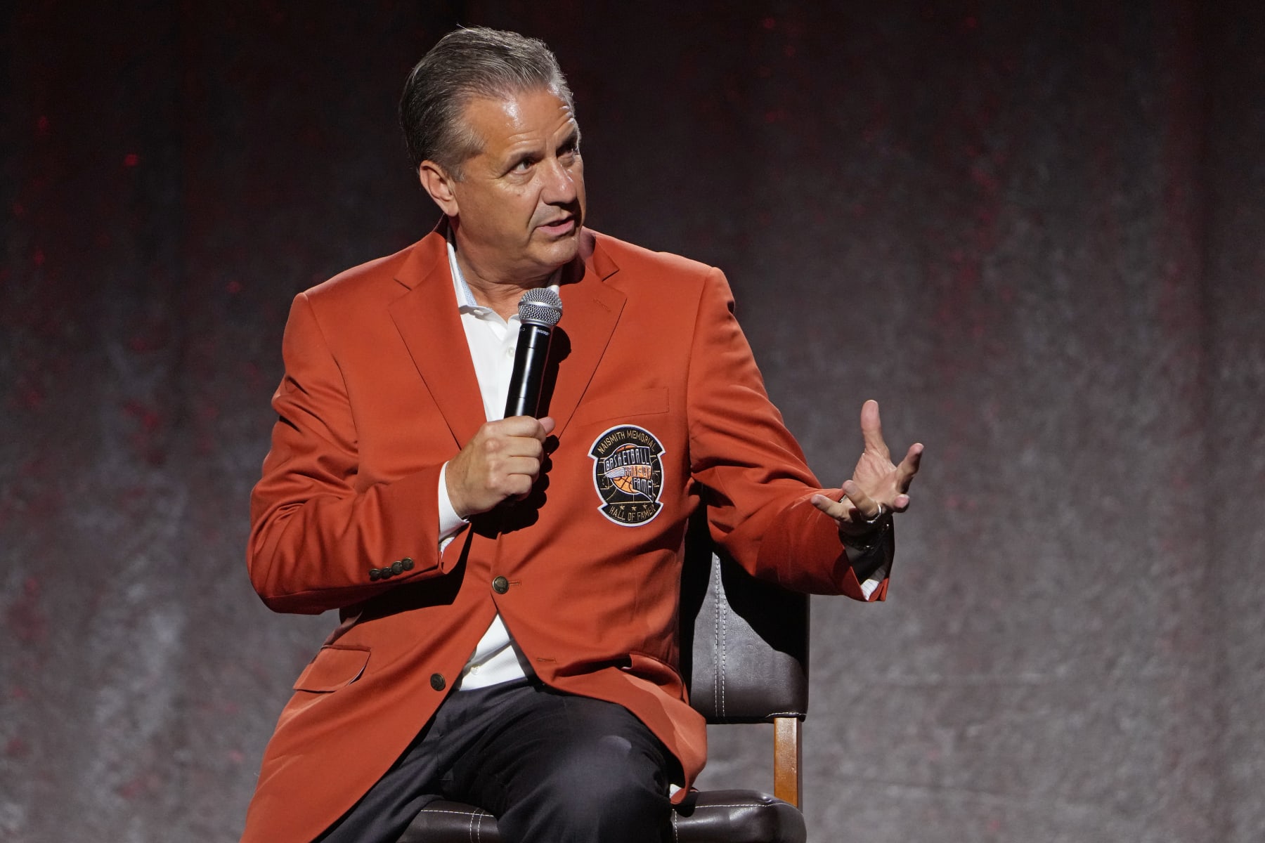 UNCASVILLE, CT - SEPTEMBER 09: John Calipari speaks on stage with The McLendon Foundation during the Class of 2022 Tip-Off Celebration and Awards Gala as part of the 2022 Basketball Hall of Fame Enshrinement Ceremony on September 9, 2022 at the Mohegan Sun Arena at Mohegan Sun in Uncasville, Connecticut. NOTE TO USER: User expressly acknowledges and agrees that, by downloading and/or using this photograph, user is consenting to the terms and conditions of the Getty Images License Agreement. Mandatory Copyright Notice: Copyright 2022 NBAE (Photo by Jesse D. Garrabrant/NBAE via Getty Images)