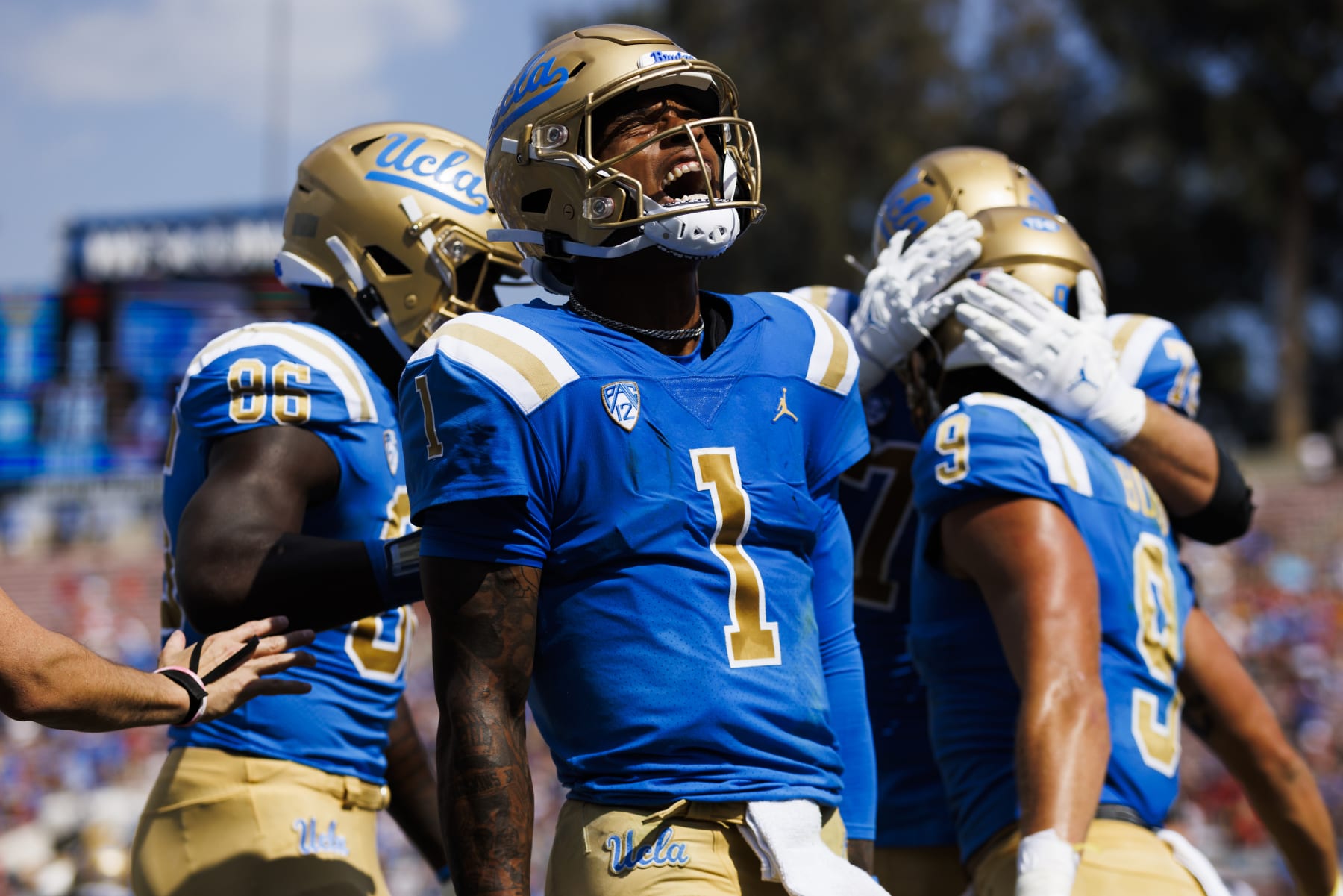 PASADENA, CA - OCTOBER 29: UCLA Bruins quarterback Dorian Thompson-Robinson (1) celebrates a touchdown during the college football game between the Utah Utes and the UCLA Bruins on Saturday, October 8, 2022 at the Rose Bowl in Pasadena, CA. (Photo by Ric Tapia/Icon Sportswire via Getty Images)