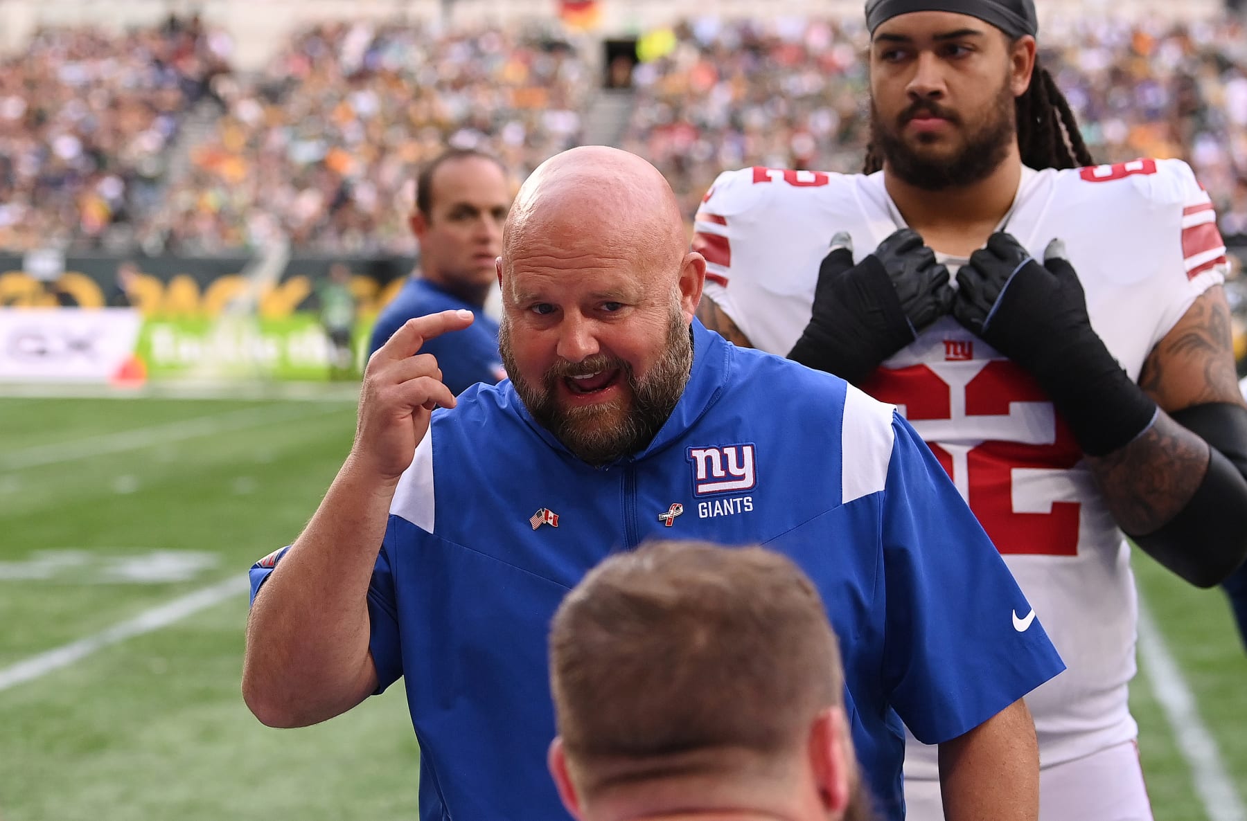 LONDON, ENGLAND - OCTOBER 09: Brian Daboll, Head Coach of the New York Giants gives their team instructions in the second half during the NFL match between New York Giants and Green Bay Packers at Tottenham Hotspur Stadium on October 09, 2022 in London, England. (Photo by Stu Forster/Getty Images) LONDON, ENGLAND - OCTOBER 09: Brian Daboll, Head Coach of the New York Giants gives their team instructions in the second half during the NFL match between New York Giants and Green Bay Packers at Tottenham Hotspur Stadium on October 09, 2022 in London, England. (Photo by Stu Forster/Getty Images)