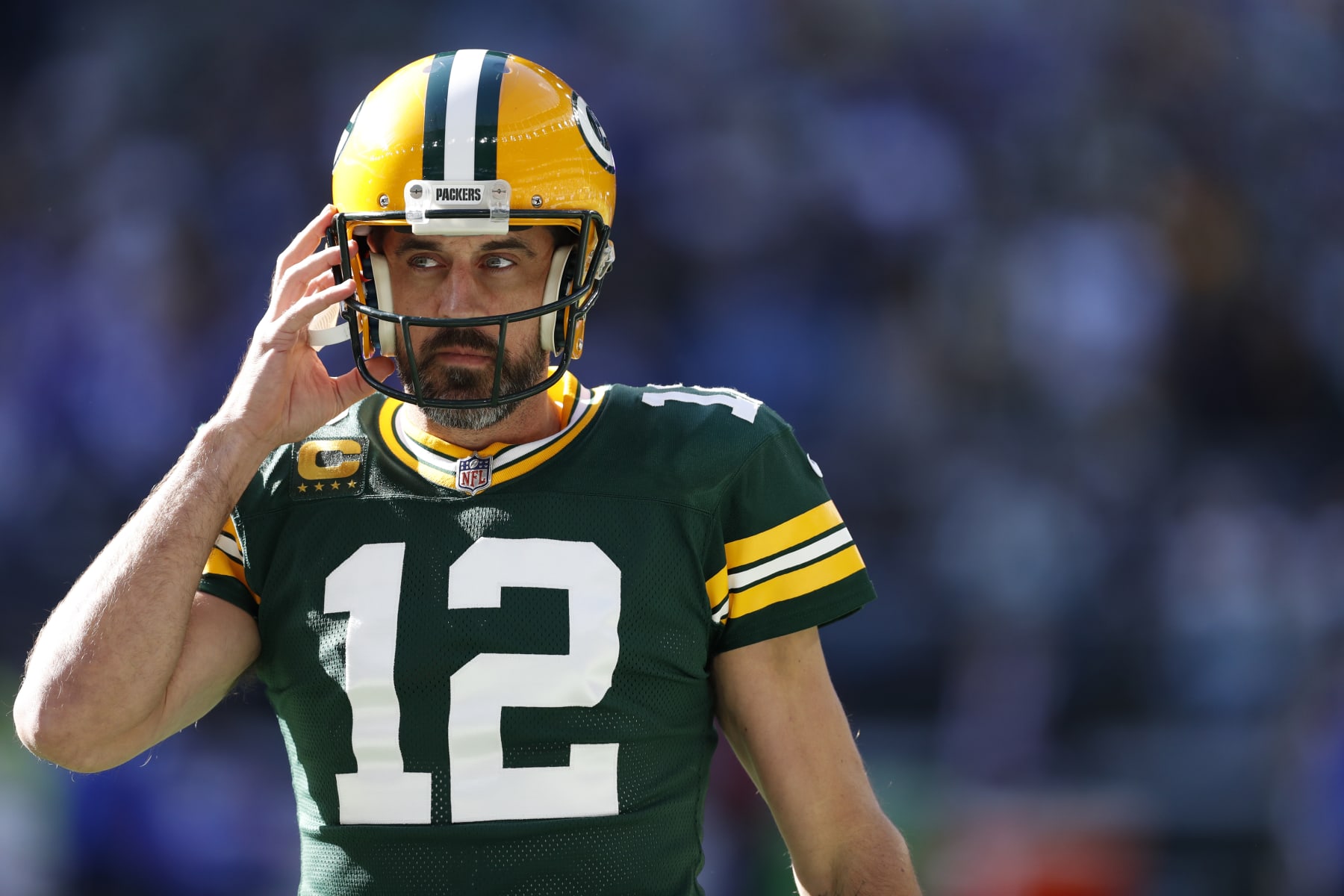 Green Bay Packers quarterback Aaron Rodgers (12) warms up before an NFL football game against the New York Giants at Tottenham Hotspur Stadium in London, Sunday, Oct. 9, 2022. (AP Photo/Steve Luciano) Green Bay Packers quarterback Aaron Rodgers (12) warms up before an NFL football game against the New York Giants at Tottenham Hotspur Stadium in London, Sunday, Oct. 9, 2022. (AP Photo/Steve Luciano)