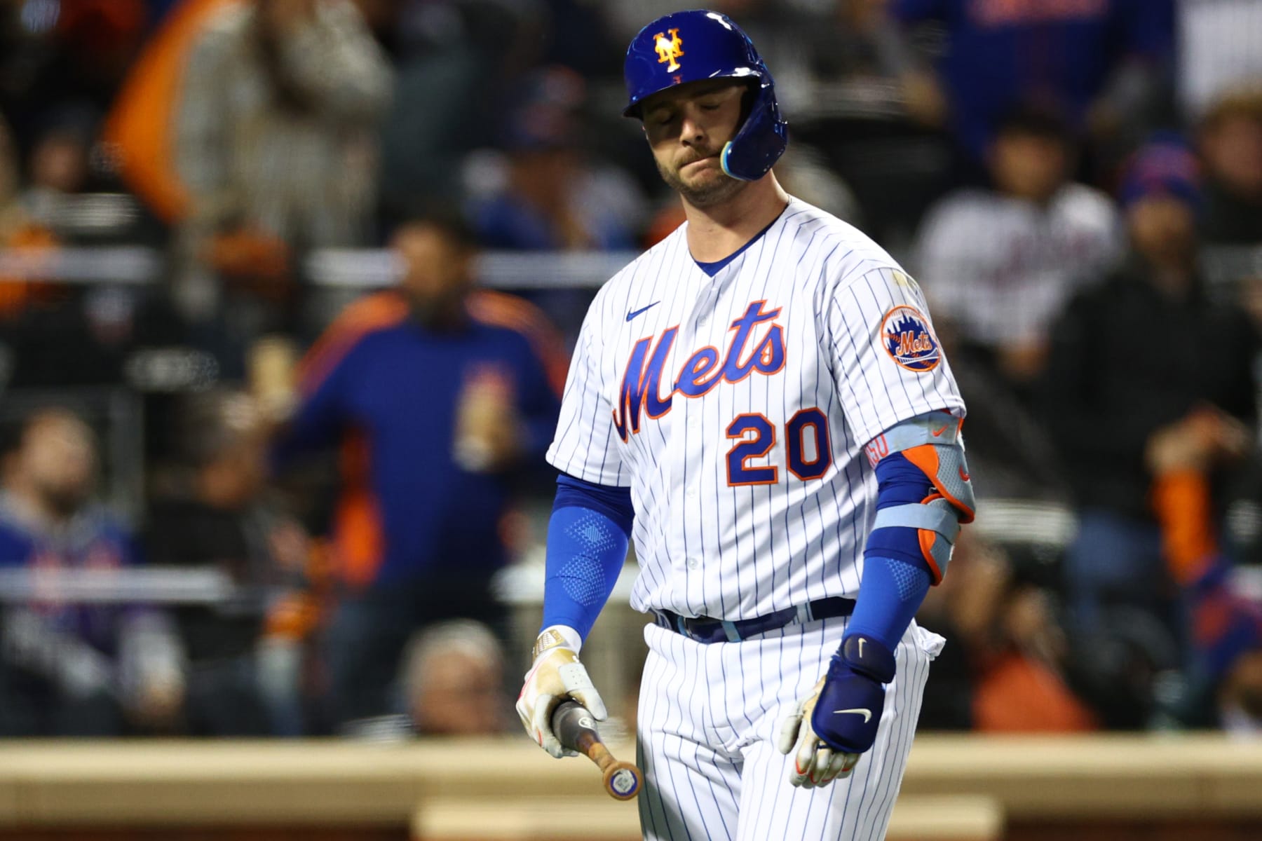 NEW YORK, NEW YORK - OCTOBER 08: Pete Alonso #20 of the New York Mets reacts to striking out during the third inning against the San Diego Padres in game two of the Wild Card Series at Citi Field on October 08, 2022 in New York City. (Photo by Elsa/Getty Images)