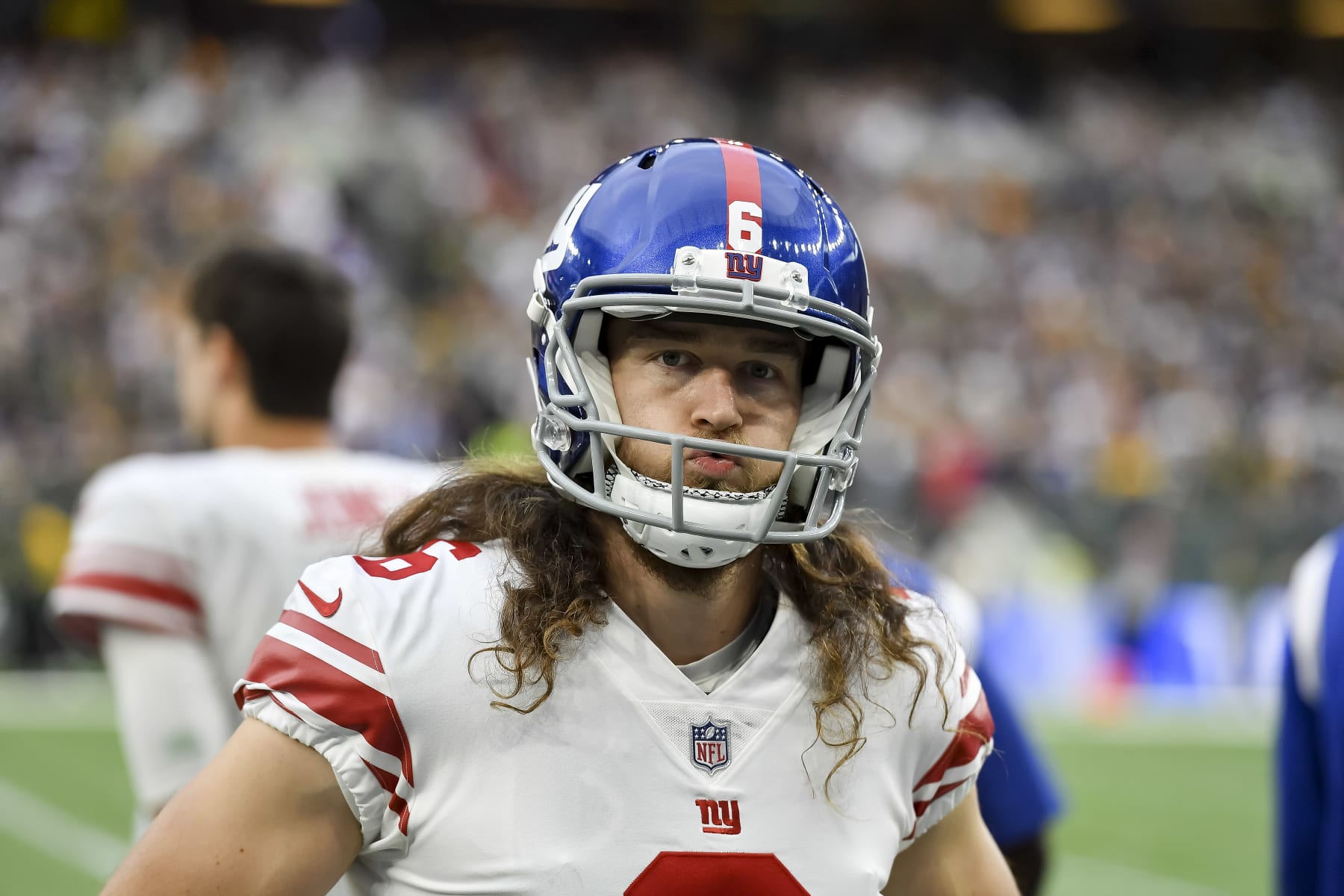 Punter Gillan returns from London and practices with Giants