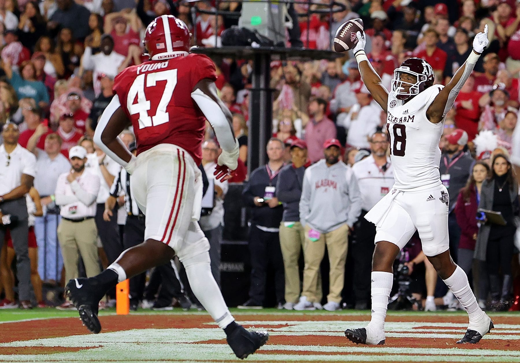 TUSCALOOSA, ALABAMA - OCTOBER 08: Donovan Green #18 of the Texas A&M Aggies reacts after pulling in this touchdown reception against the Alabama Crimson Tide during the first half at Bryant-Denny Stadium on October 08, 2022 in Tuscaloosa, Alabama. (Photo by Kevin C. Cox/Getty Images)