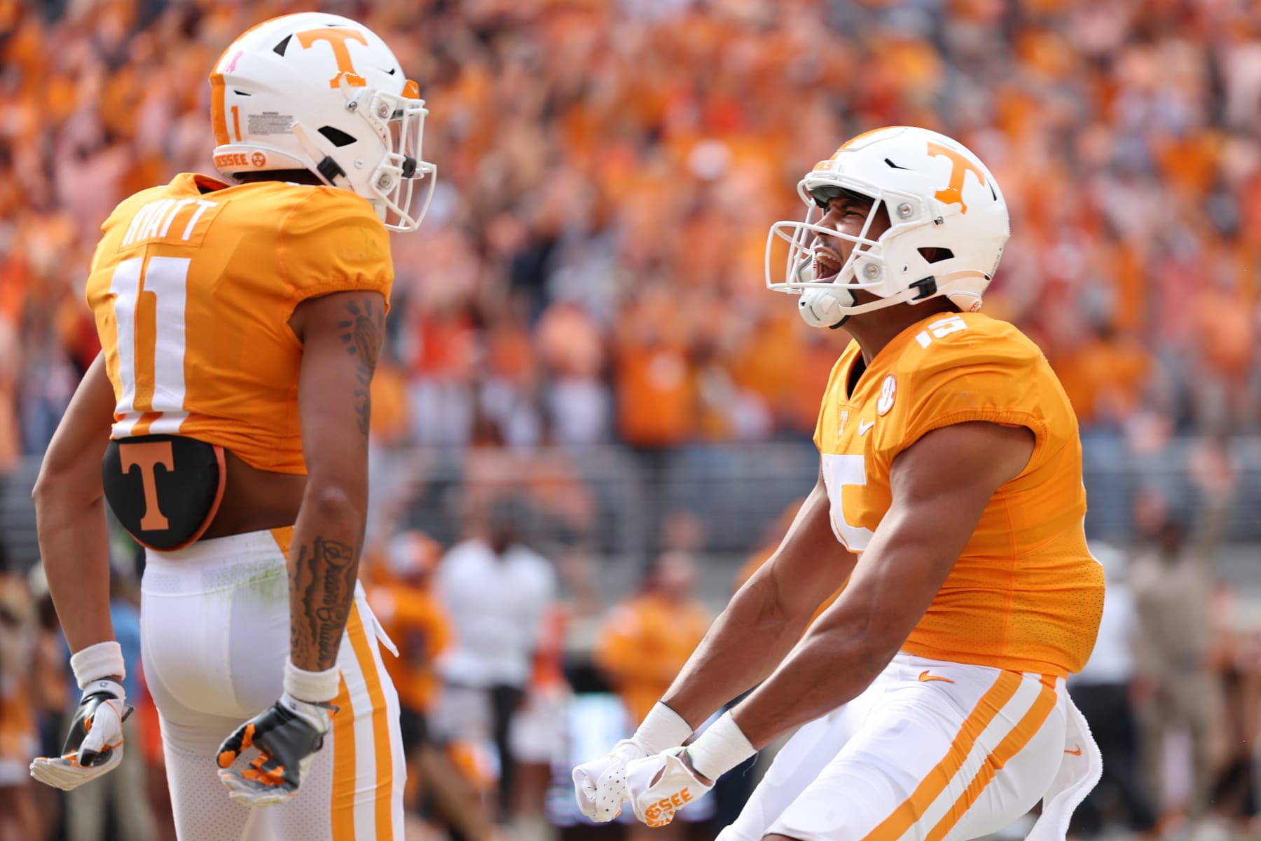 KNOXVILLE, TENNESSEE - OCTOBER 15: Wide receiver Jalin Hyatt #11 and wide receiver Bru McCoy #15 of the Tennessee Volunteers celebrate after a touchdown in the first quarter against the Alabama Crimson Tide at Neyland Stadium on October 15, 2022 in Knoxville, Tennessee. (Photo by Donald Page/Getty Images)
