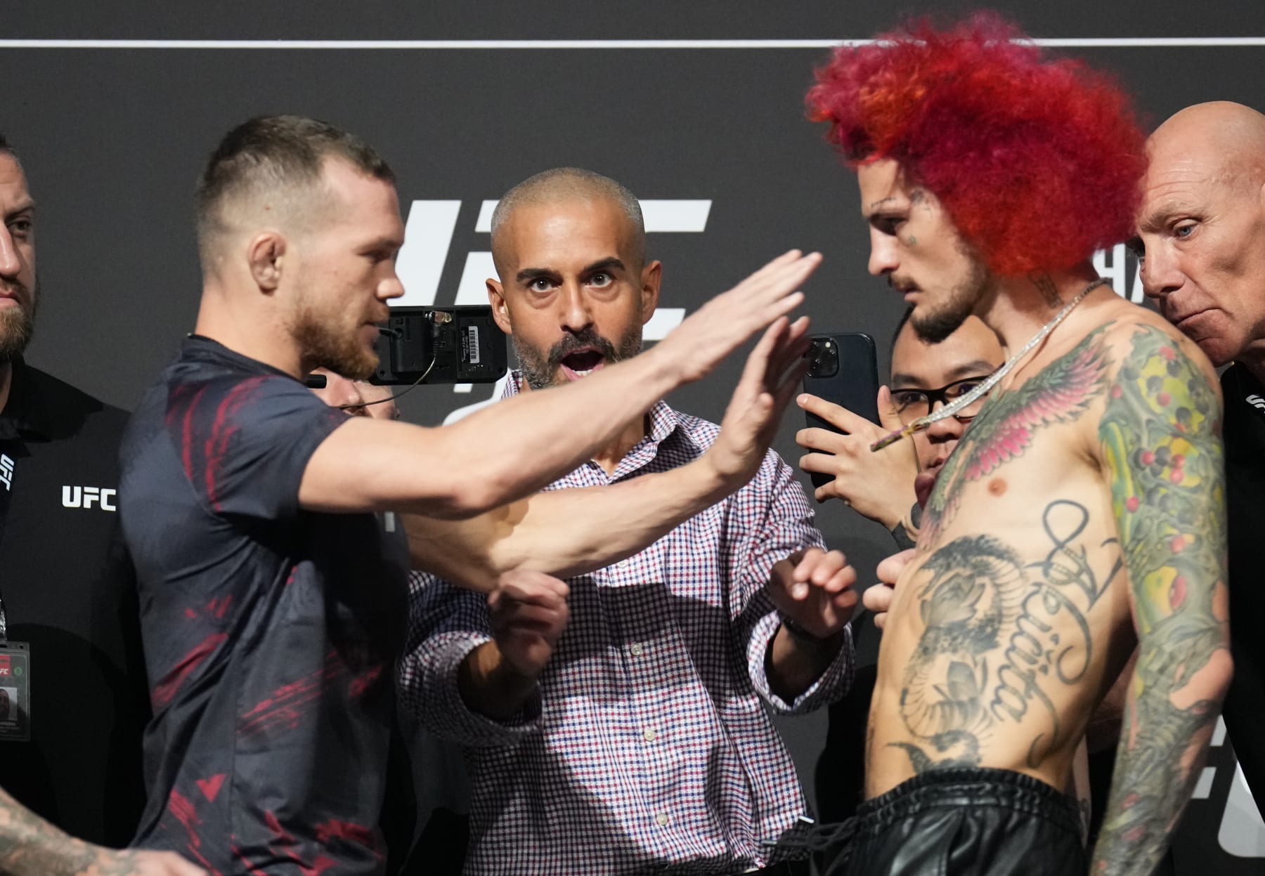 ABU DHABI, UNITED ARAB EMIRATES - OCTOBER 20: (L-R) Opponents Petr Yan of Russia and Sean O'Malley face off during the UFC 280 press conference at Etihad Arena on October 20, 2022 in Abu Dhabi, United Arab Emirates. (Photo by Chris Unger/Zuffa LLC)
