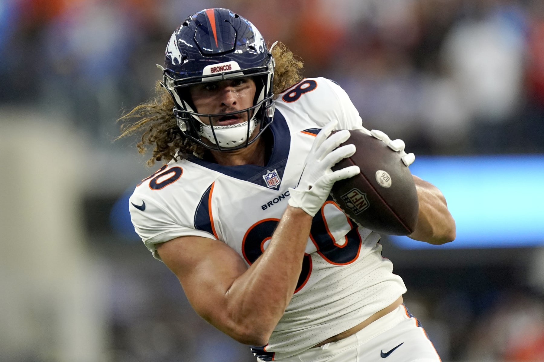 Denver Broncos tight end Greg Dulcich (80) makes a catch during