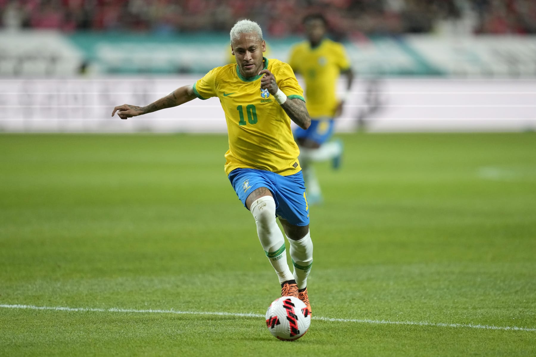FILE - Brazil's Neymar dribbles the ball during a friendly soccer match between South Korea and Brazil at Seoul World Cup Stadium in Seoul, Thursday, June 2, 2022. (AP Photo/Lee Jin-man, File)
