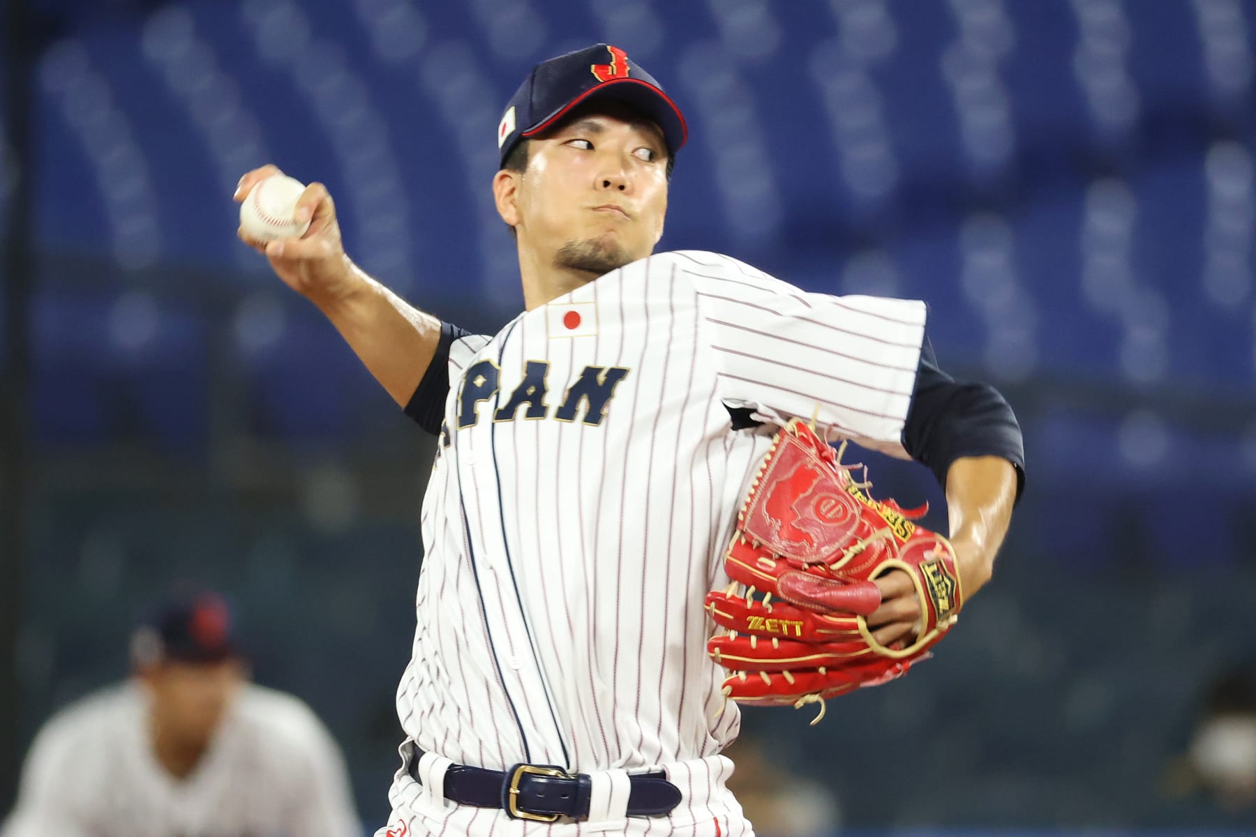 New York Mets starting pitcher Kodai Senga, from Japan, throws