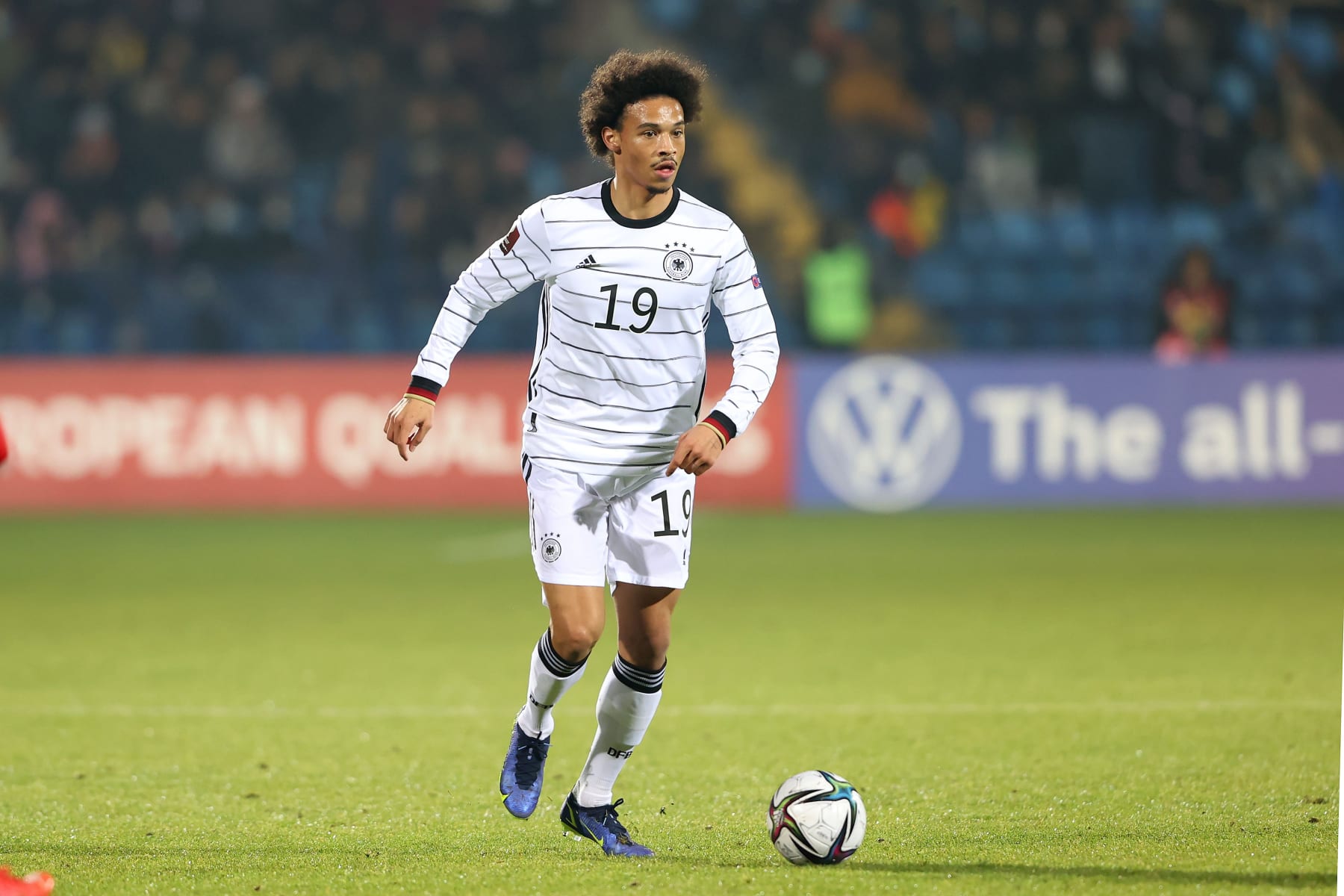 YEREVAN, ARMENIA - NOVEMBER 14: Leroy Sane of Germany runs with the ball during the 2022 FIFA World Cup Qualifier match between Armenia and Germany at Republican Stadium after Vazgen Sargsyan on November 14, 2021 in Yerevan, Armenia. (Photo by Alexander Hassenstein/Getty Images)