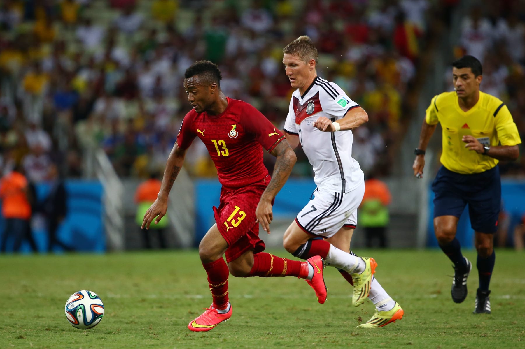 FORTALEZA, BRAZIL - JUNE 21: Jordan Ayew of Ghana controls the ball as Bastian Schweinsteiger of Germany gives chase during the 2014 FIFA World Cup Brazil Group G match between Germany and Ghana at Castelao on June 21, 2014 in Fortaleza, Brazil. (Photo by Robert Cianflone/Getty Images)