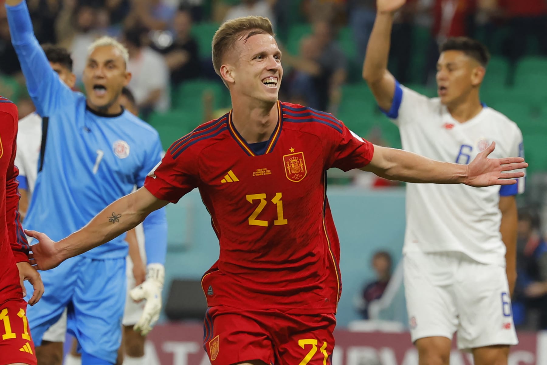 Spain's forward #21 Dani Olmo celebrates scoring the opening goal during the Qatar 2022 World Cup Group E football match between Spain and Costa Rica at the Al-Thumama Stadium in Doha on November 23, 2022. (Photo by Odd ANDERSEN / AFP) (Photo by ODD ANDERSEN/AFP via Getty Images)