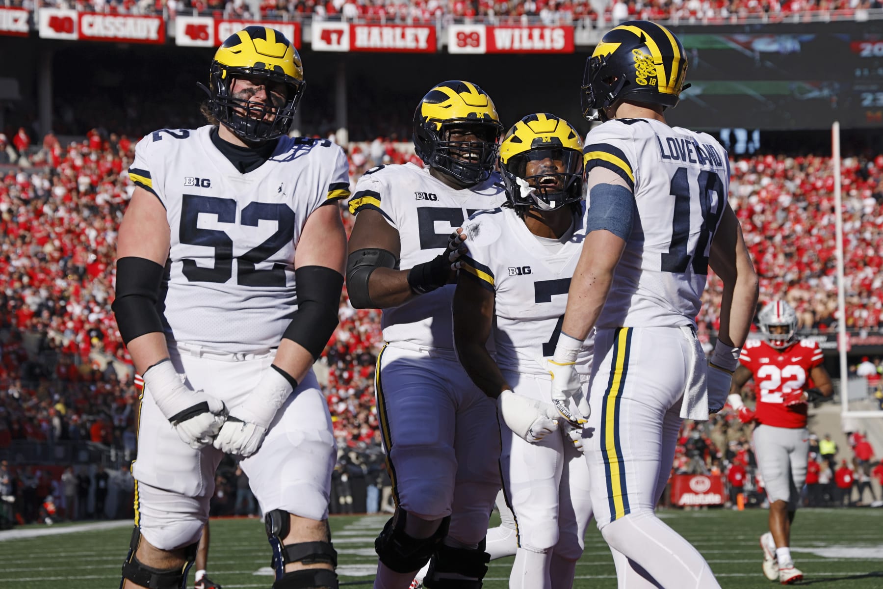 COLUMBUS, OH - NOVEMBER 26: Michigan Wolverines tight end Colston Loveland (18) celebrates with teammates after a 45-yard touchdown catch in the third quarter of a college football game against the Ohio State Buckeyes on November 26, 2022 at Ohio Stadium in Columbus, Ohio. (Photo by Joe Robbins/Icon Sportswire via Getty Images)